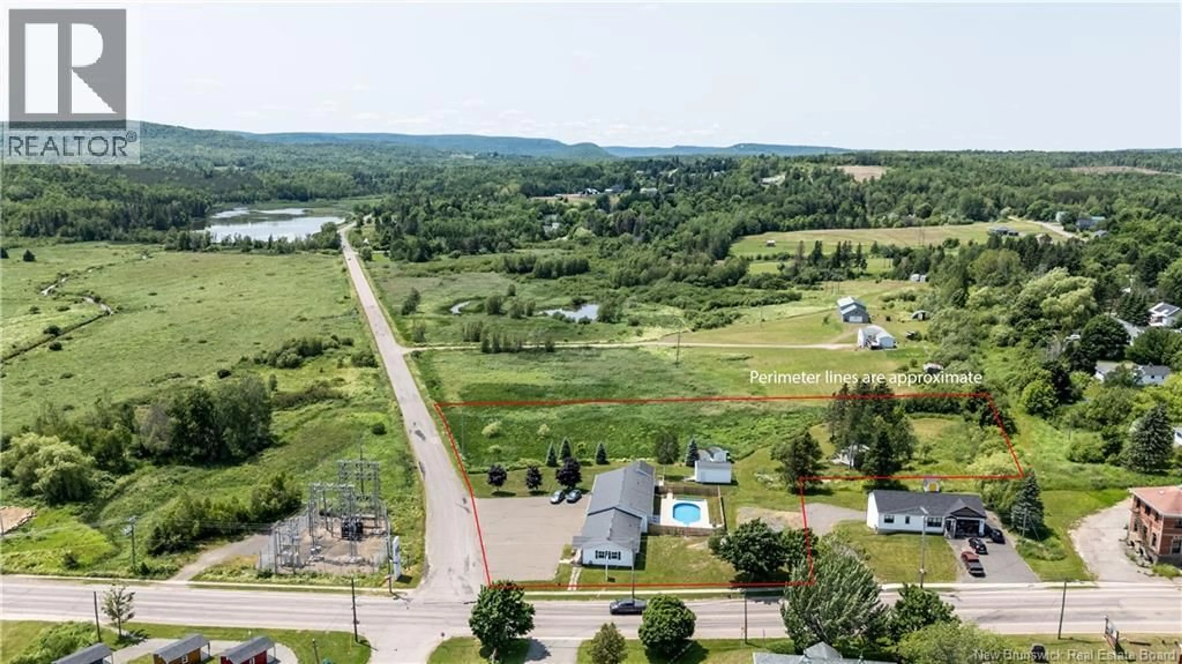 A pic from outside/outdoor area/front of a property/back of a property/a pic from drone, water/lake/river/ocean view for 1 GOLF CLUB ROAD, Hillsborough New Brunswick E4H2T7