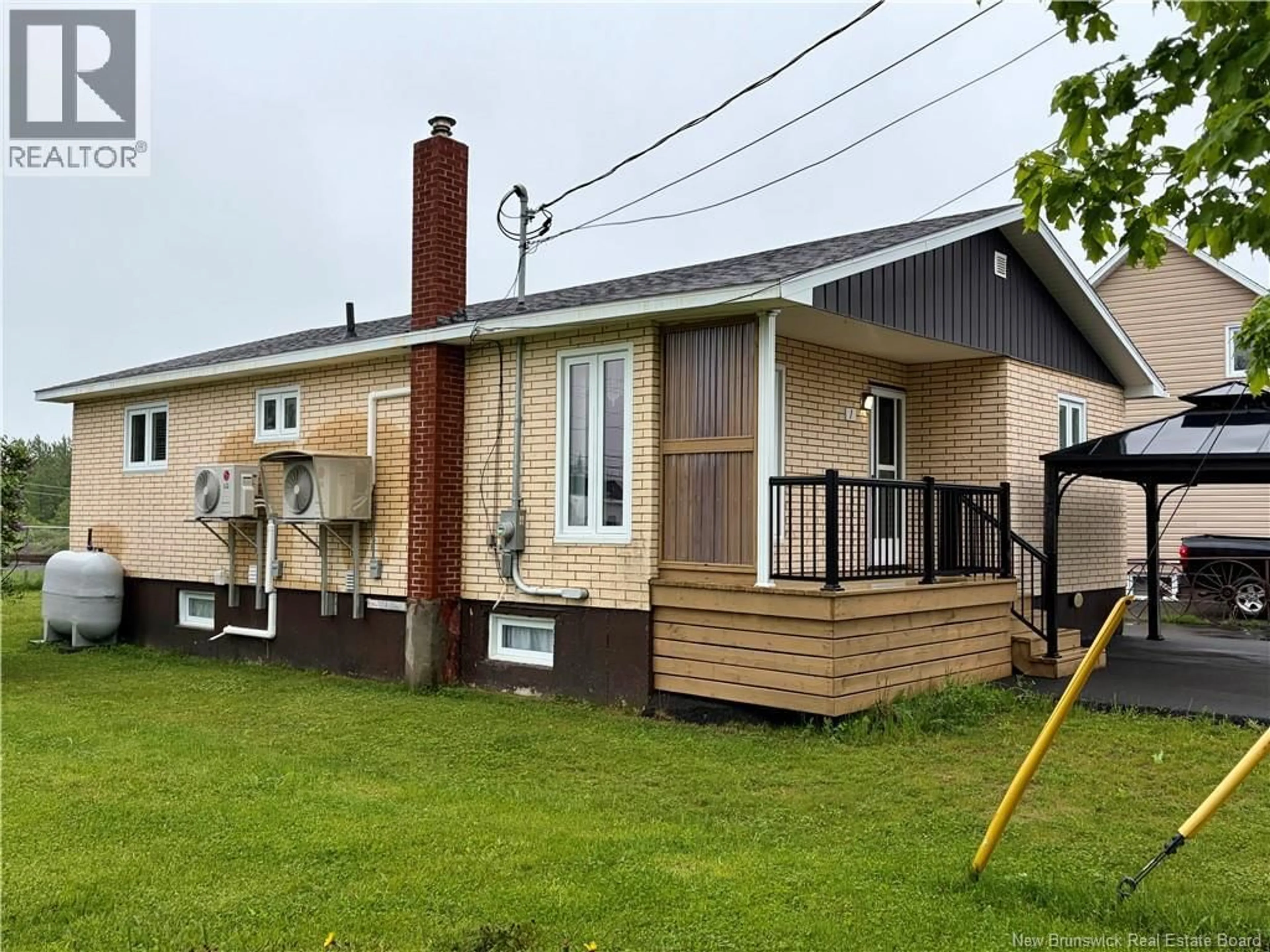 Home with vinyl exterior material, street for 1 DE L'EGLISE, Eel River Crossing New Brunswick E8E1P5