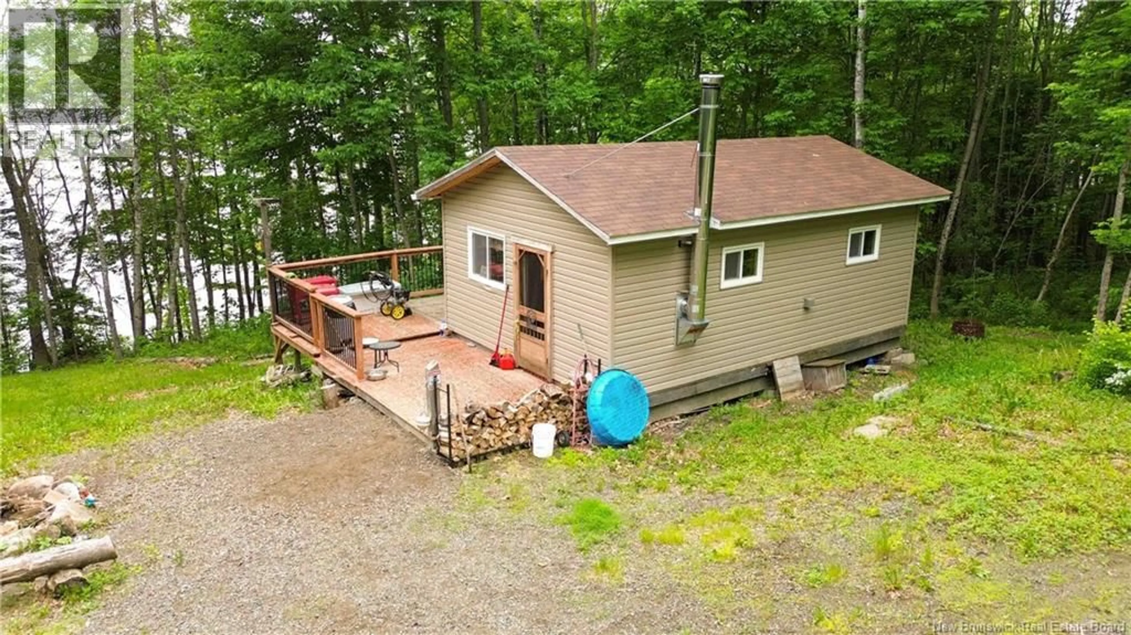 A pic from outside/outdoor area/front of a property/back of a property/a pic from drone, unknown for 4695 ROUTE 105, Nackawic New Brunswick E3G1Y7