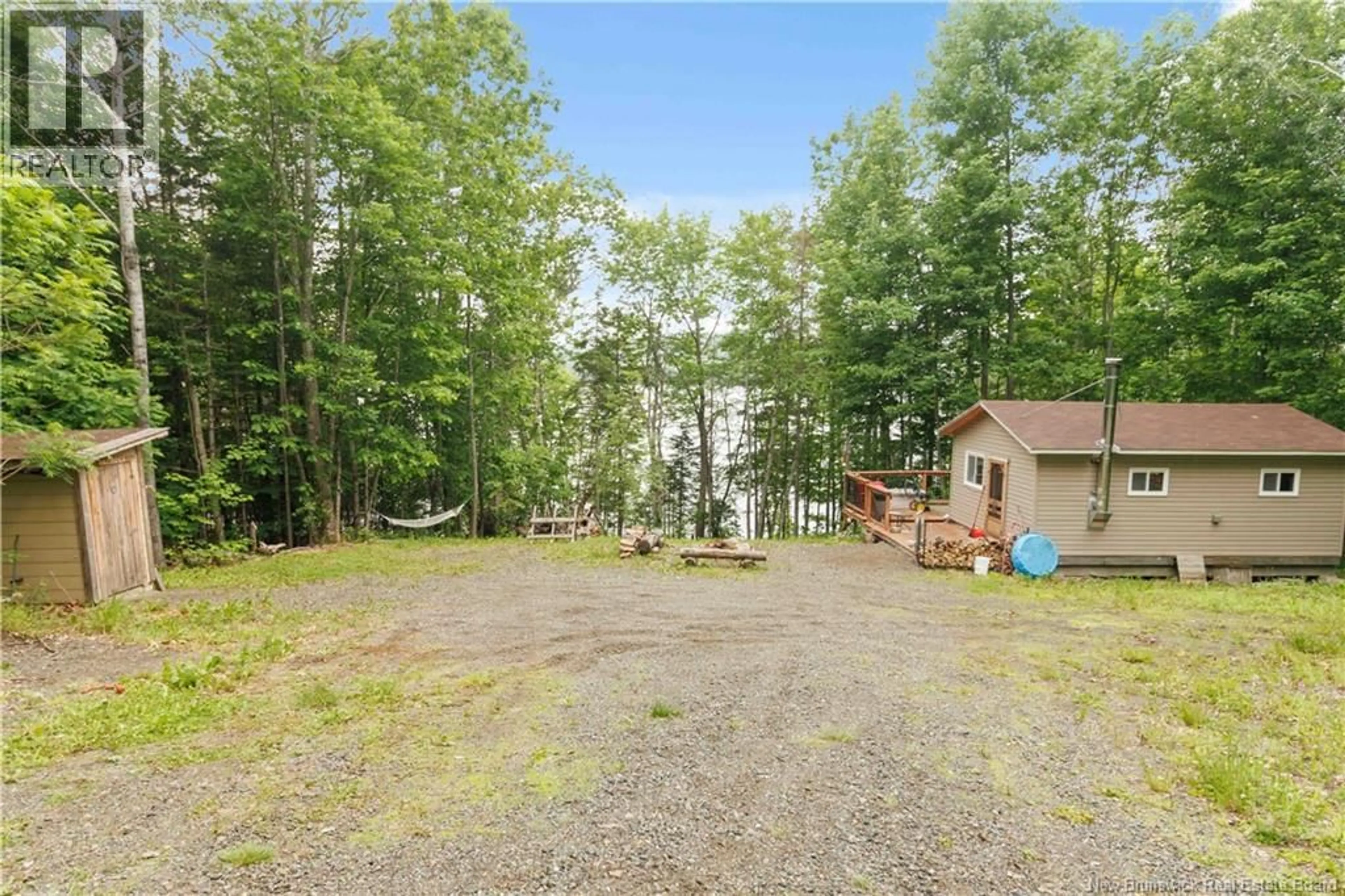 A pic from outside/outdoor area/front of a property/back of a property/a pic from drone, forest/trees view for 4695 ROUTE 105, Nackawic New Brunswick E3G1Y7