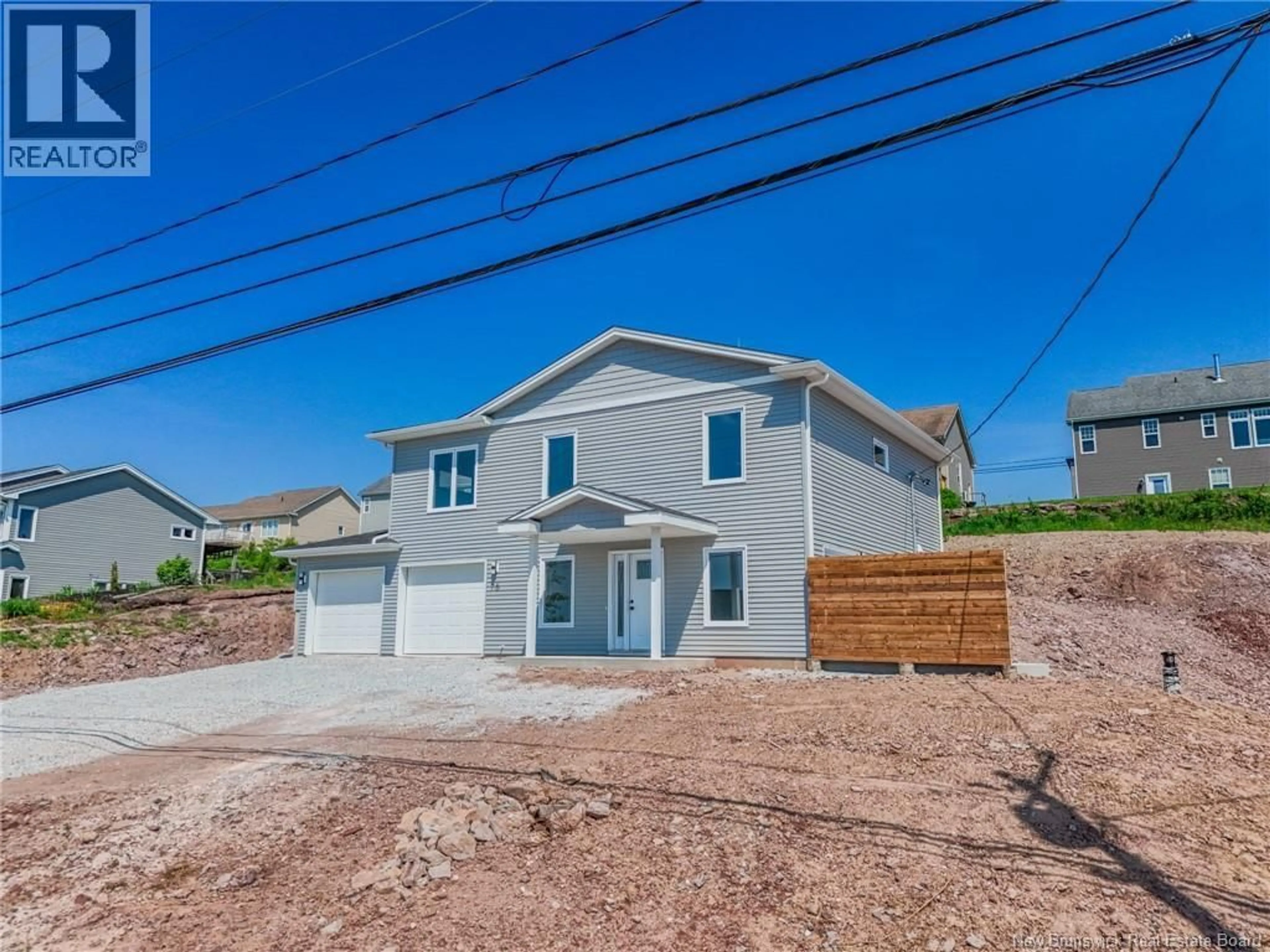 Home with vinyl exterior material, street for 76 SQUIRE DRIVE, Quispamsis New Brunswick E2G0B5