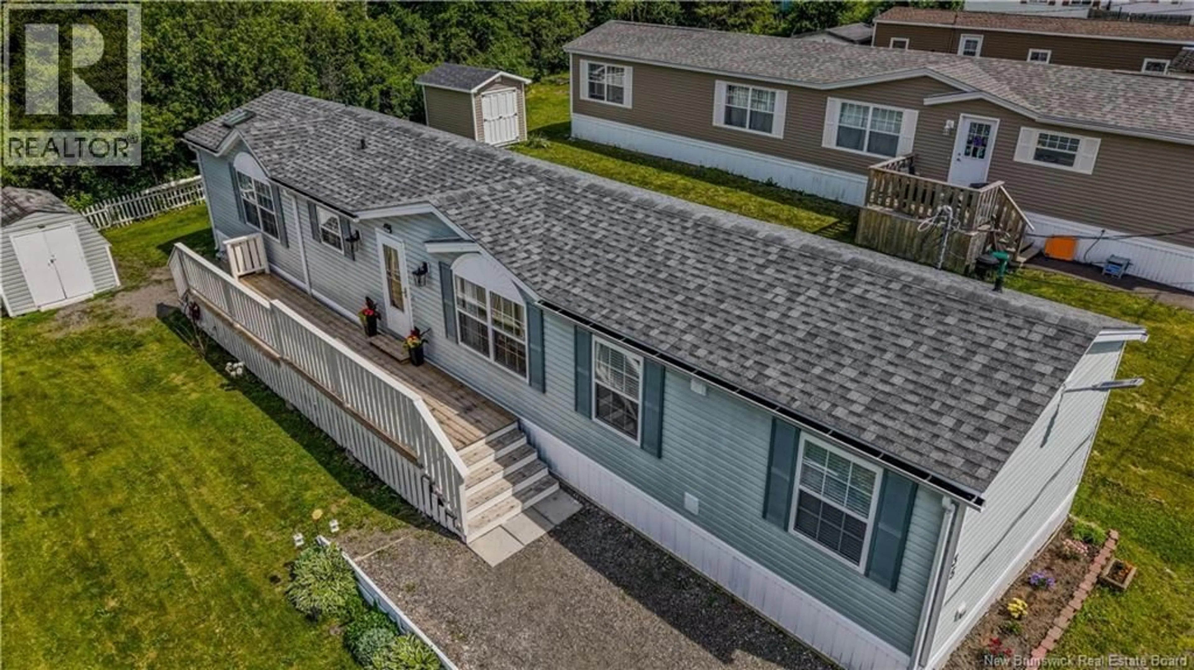 A pic from outside/outdoor area/front of a property/back of a property/a pic from drone, street for 35 LUPIN AVENUE, Riverview New Brunswick E1B5A6