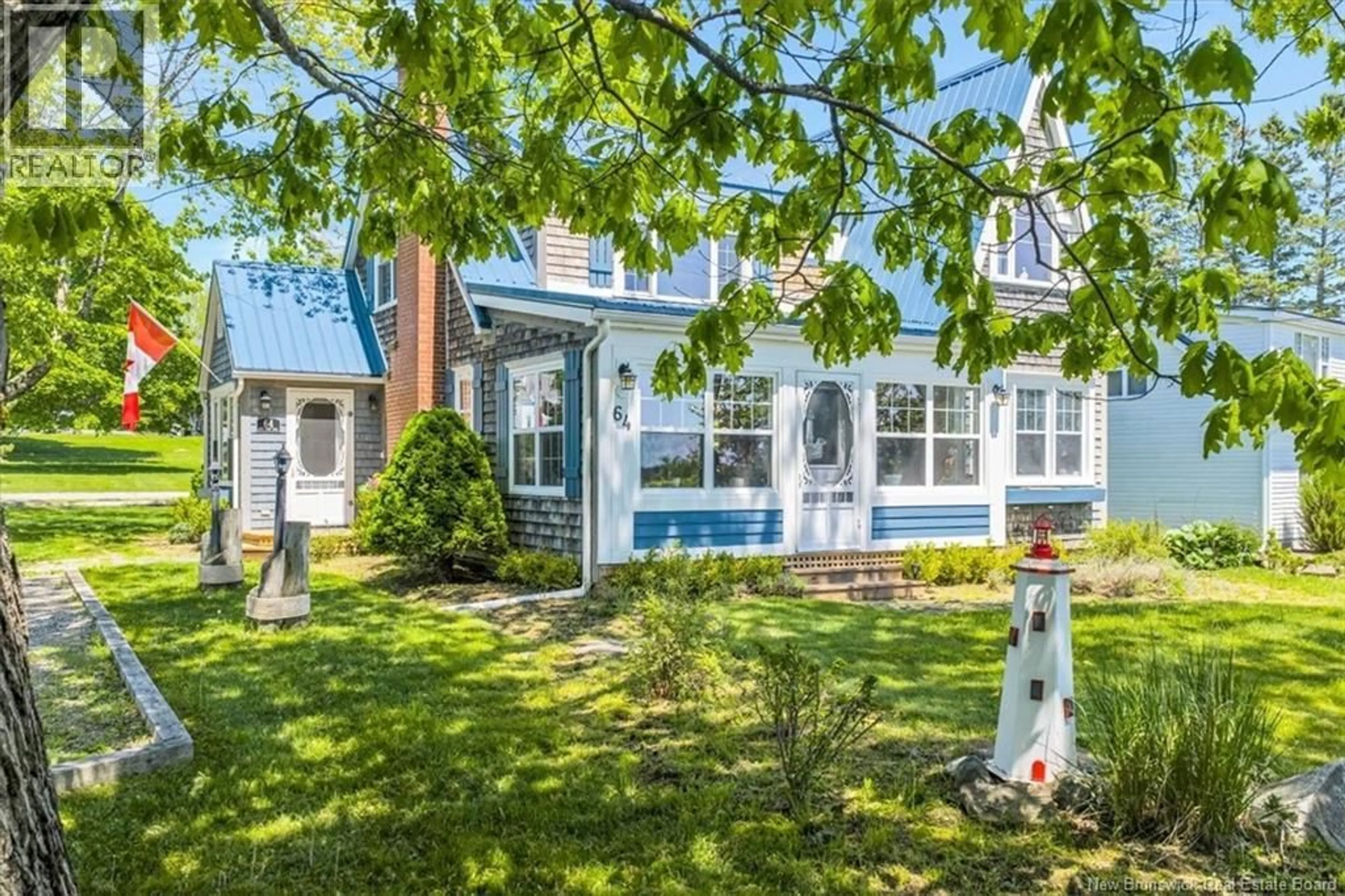Home with vinyl exterior material, street for 64 JOE'S POINT ROAD, Saint Andrews New Brunswick E5B2J8