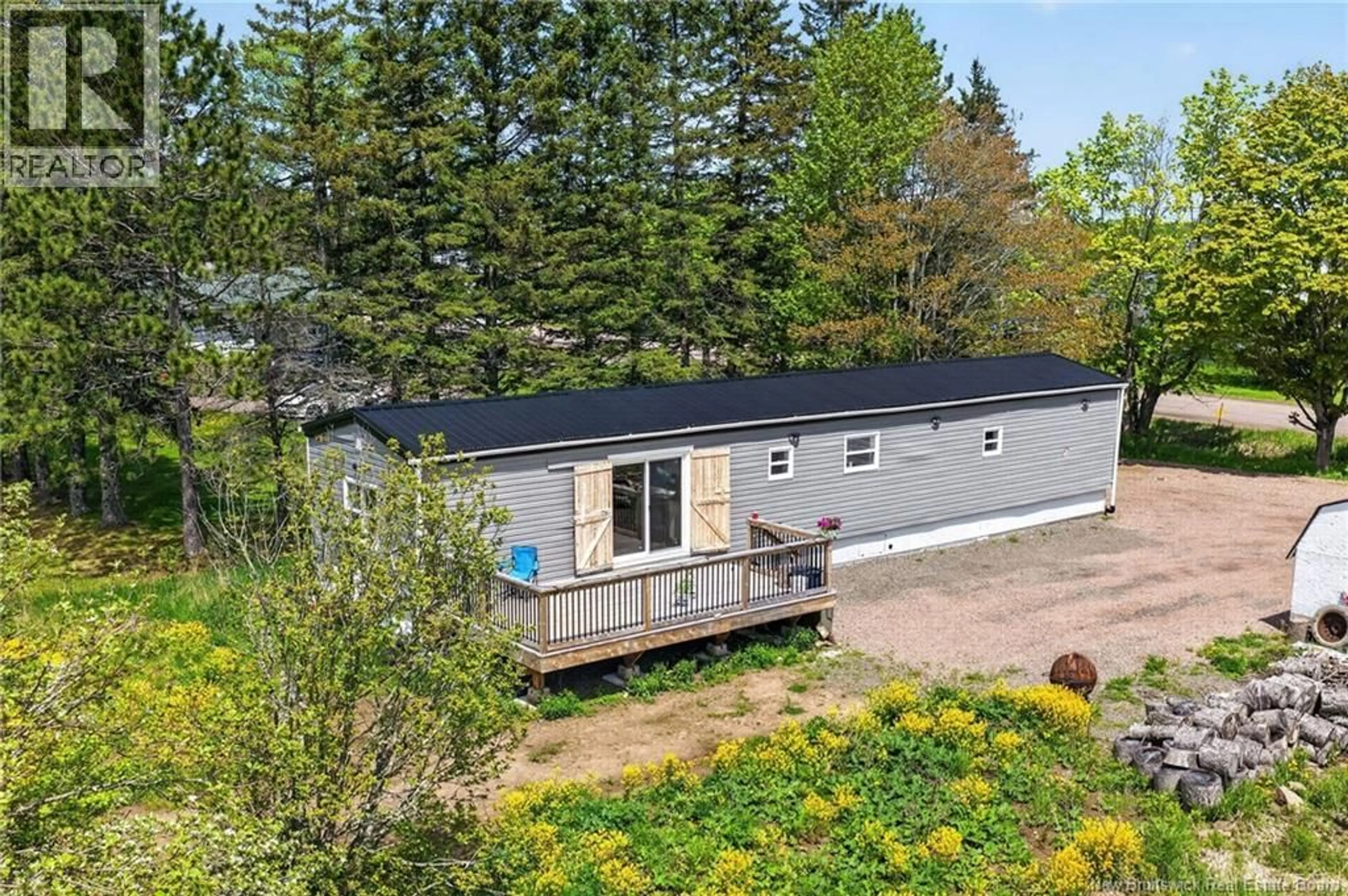 A pic from outside/outdoor area/front of a property/back of a property/a pic from drone, unknown for 3351 ROUTE 132, Scoudouc New Brunswick E4P3S1