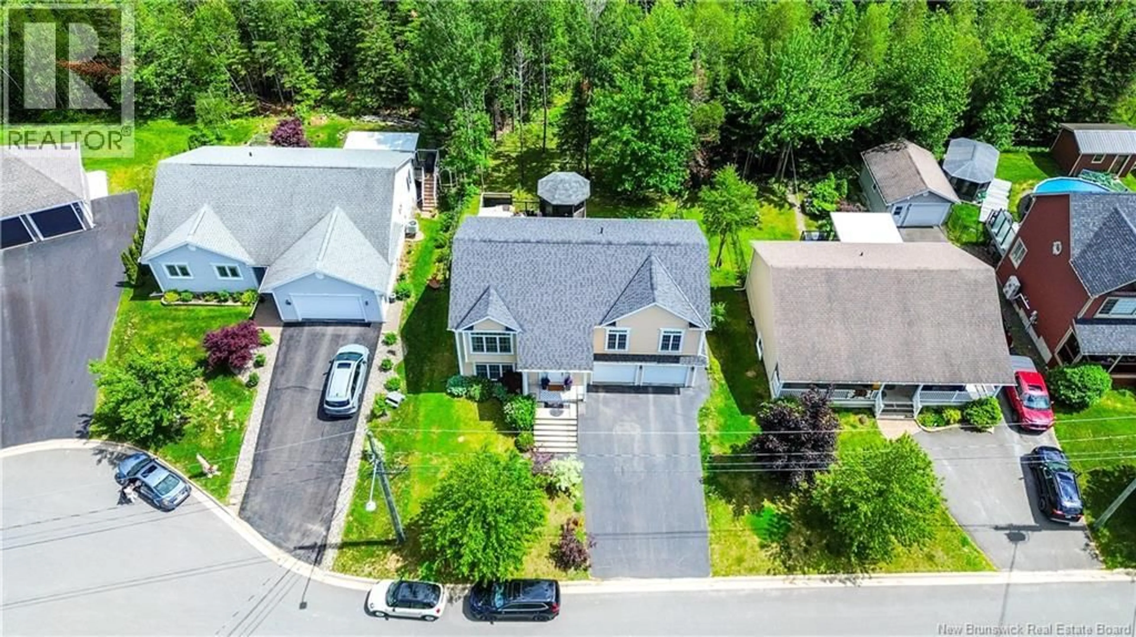 A pic from outside/outdoor area/front of a property/back of a property/a pic from drone, street for 70 RED MAPLE COURT, Fredericton New Brunswick E3B0E1