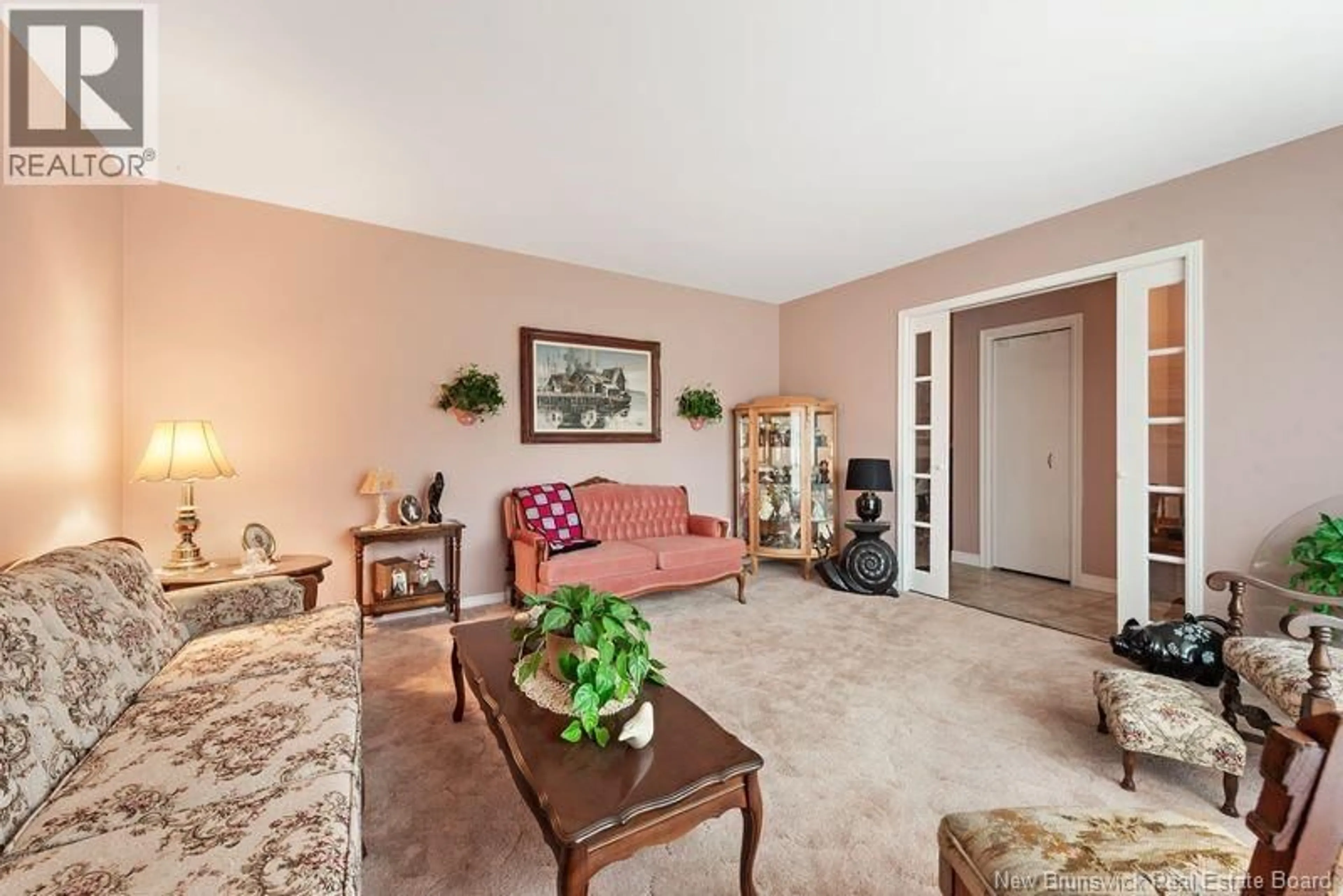 Living room with furniture, carpet floor for 107 OLYMPIC CRESCENT, Moncton New Brunswick E1E4B8