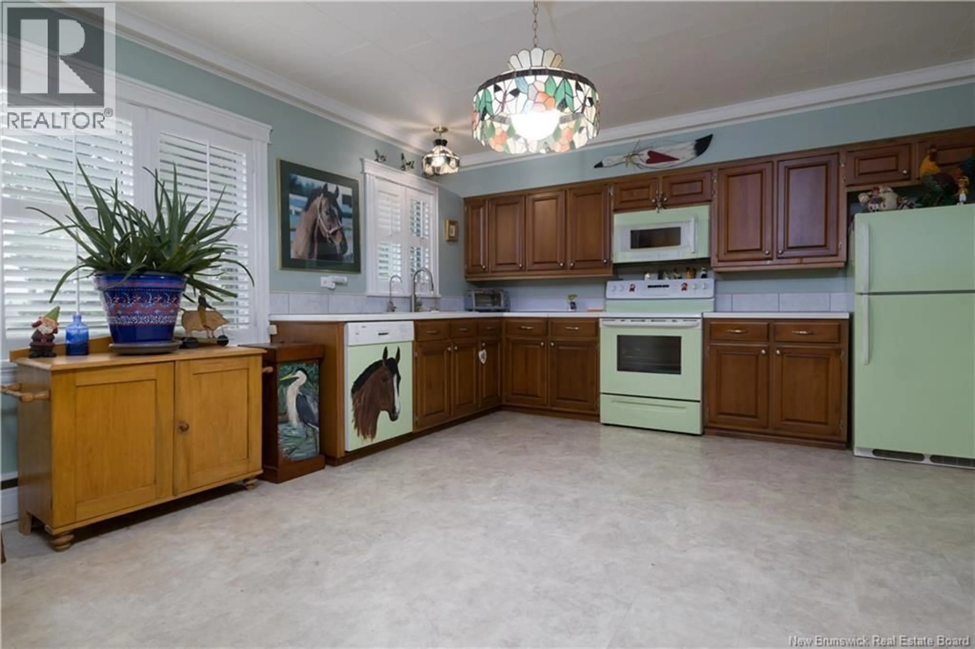 Open concept kitchen, ceramic/tile floor for 16 BEAULIEU STREET, Grand-Sault/Grand Falls New Brunswick E3Y1C9