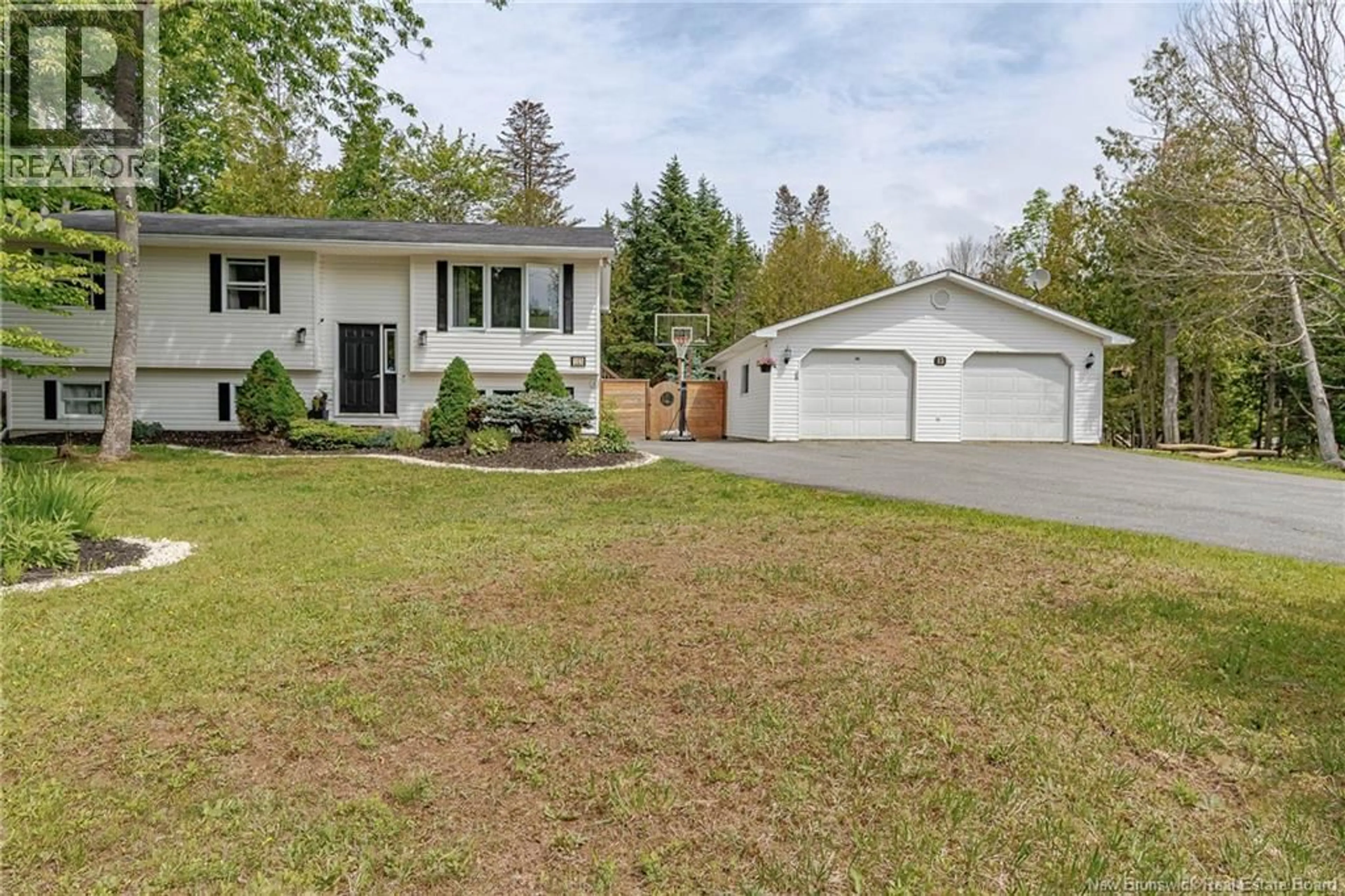 Home with vinyl exterior material, street for 13 CLIFF STREET, Quispamsis New Brunswick E2G1Y4
