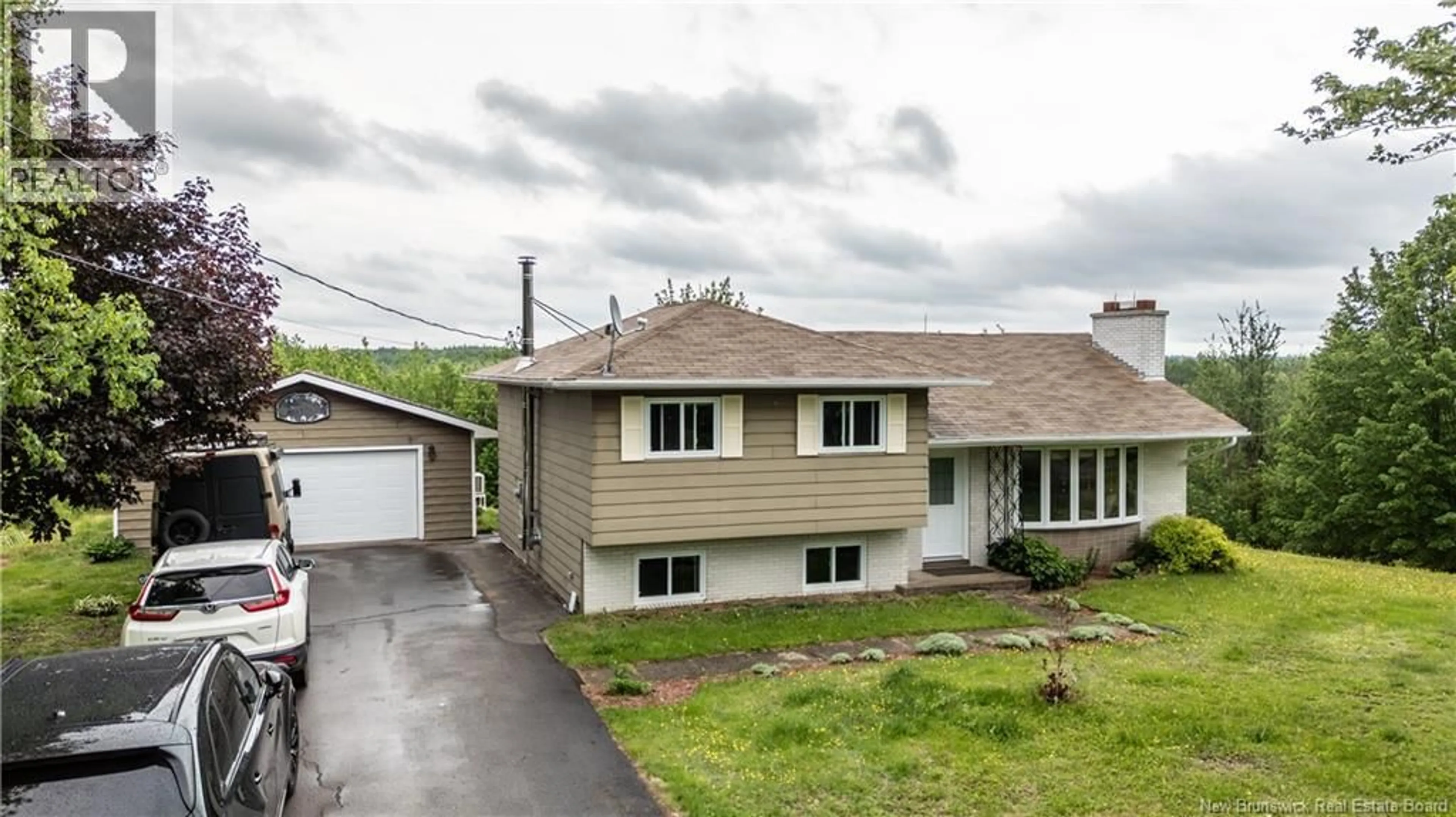 A pic from outside/outdoor area/front of a property/back of a property/a pic from drone, street for 3228 ROUTE 465, Beersville New Brunswick E4T2P7