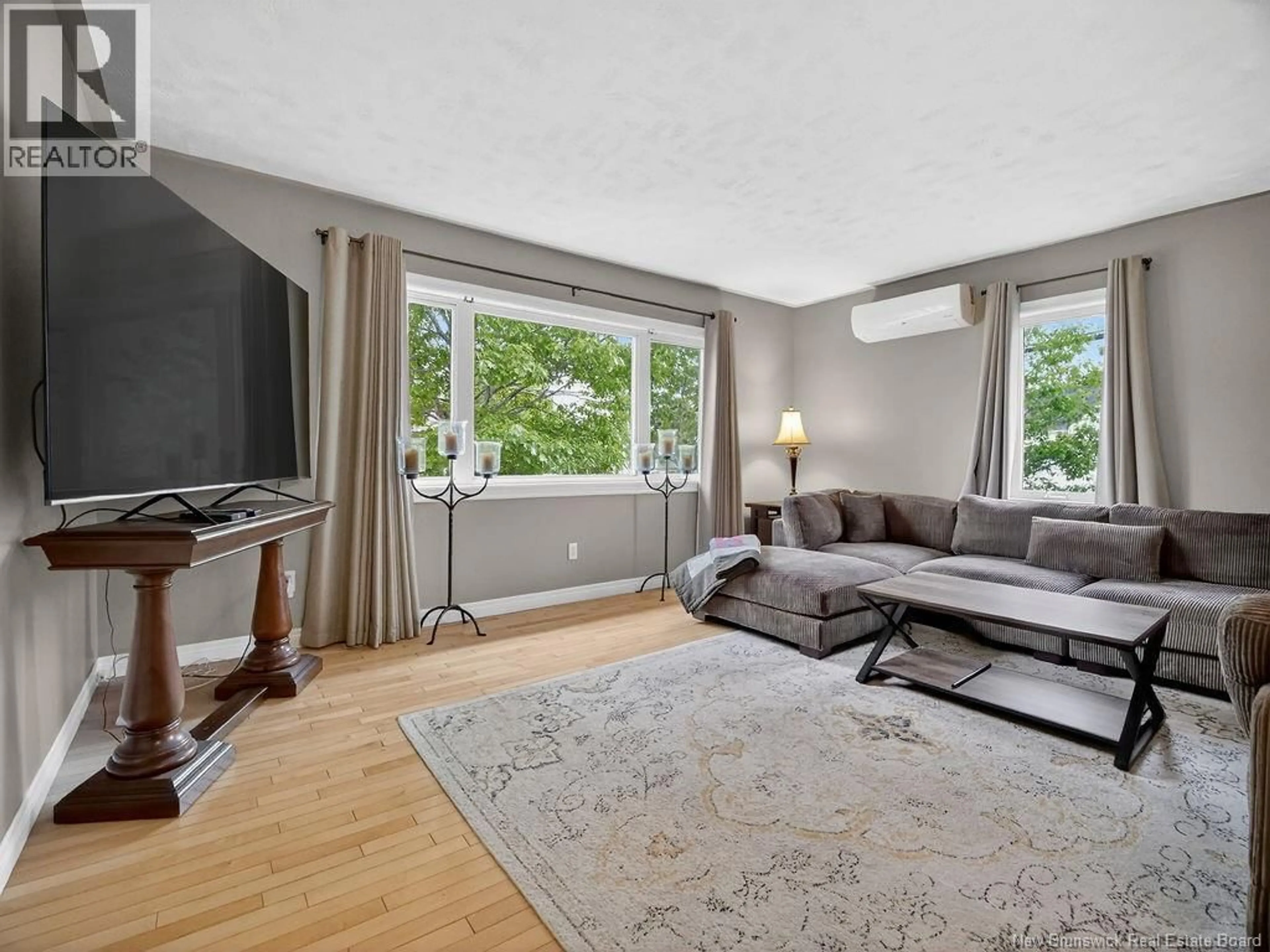Living room with furniture, unknown for 26 CUNARD STREET, Richibucto New Brunswick E4W3Z1