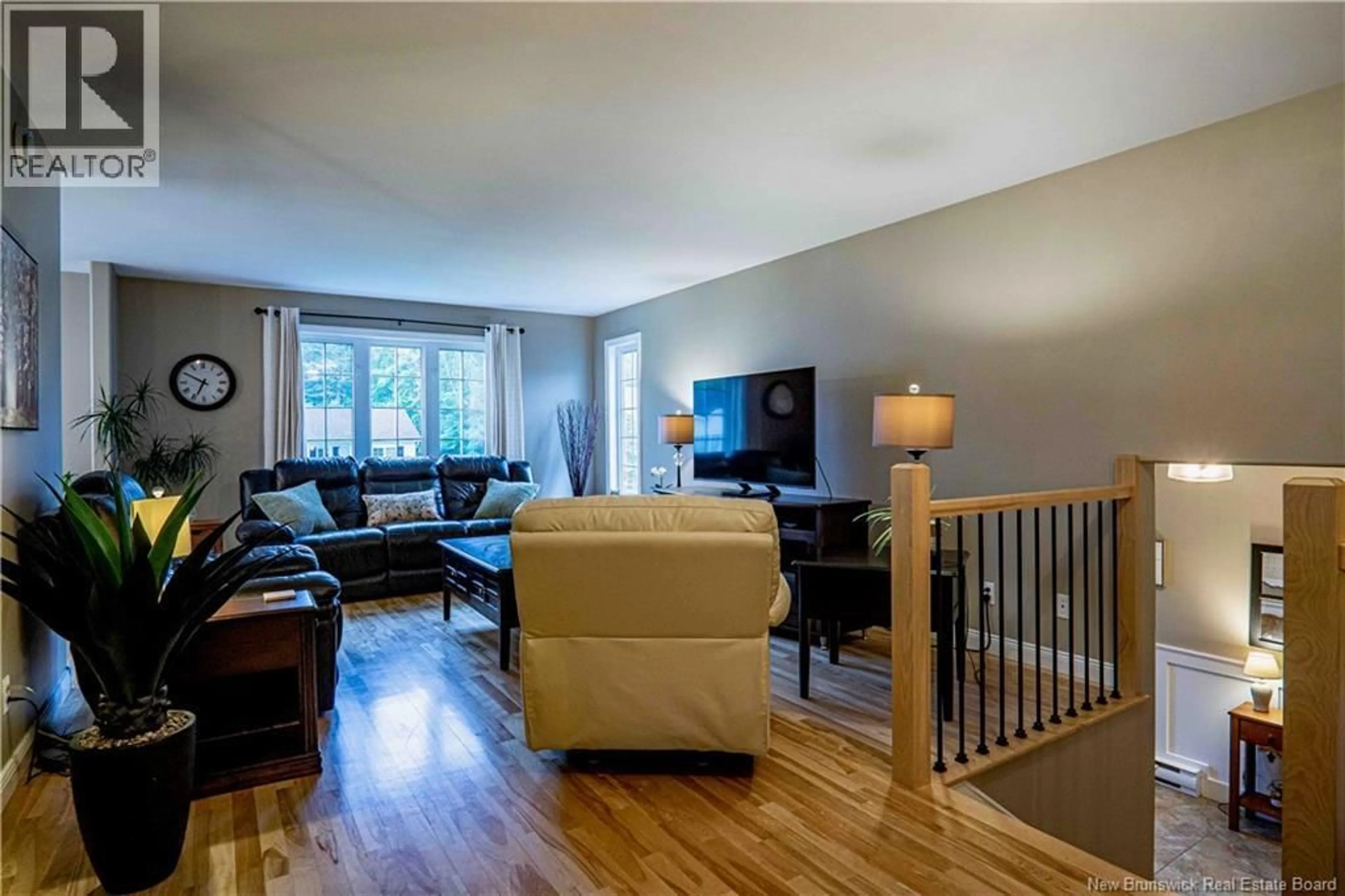 Living room with furniture, wood/laminate floor for 38 MELBA STREET, New Maryland New Brunswick E3C1C1