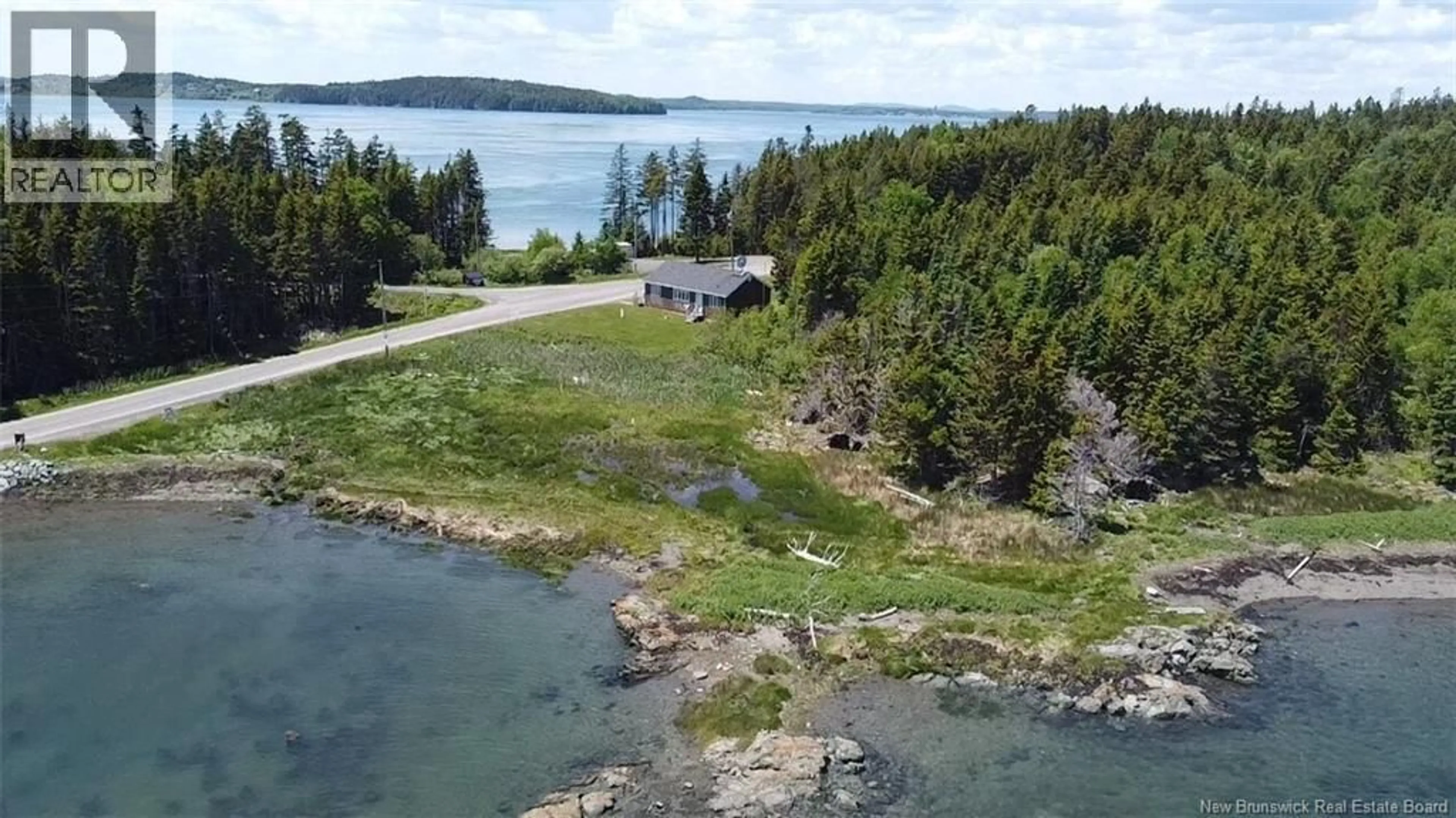 A pic from outside/outdoor area/front of a property/back of a property/a pic from drone, water/lake/river/ocean view for 175 DEER ISLAND POINT ROAD, Cummings Cove New Brunswick E5V1G5