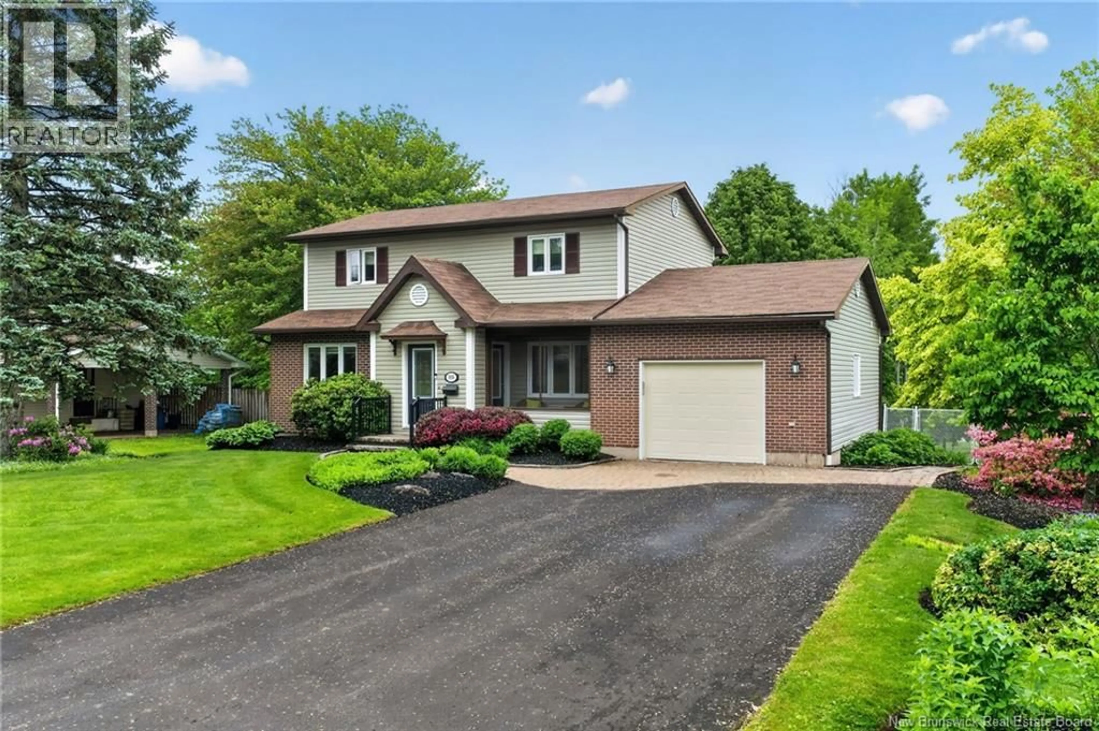 Home with vinyl exterior material, street for 515 AVANT GARDE, Dieppe New Brunswick E1A5Z4