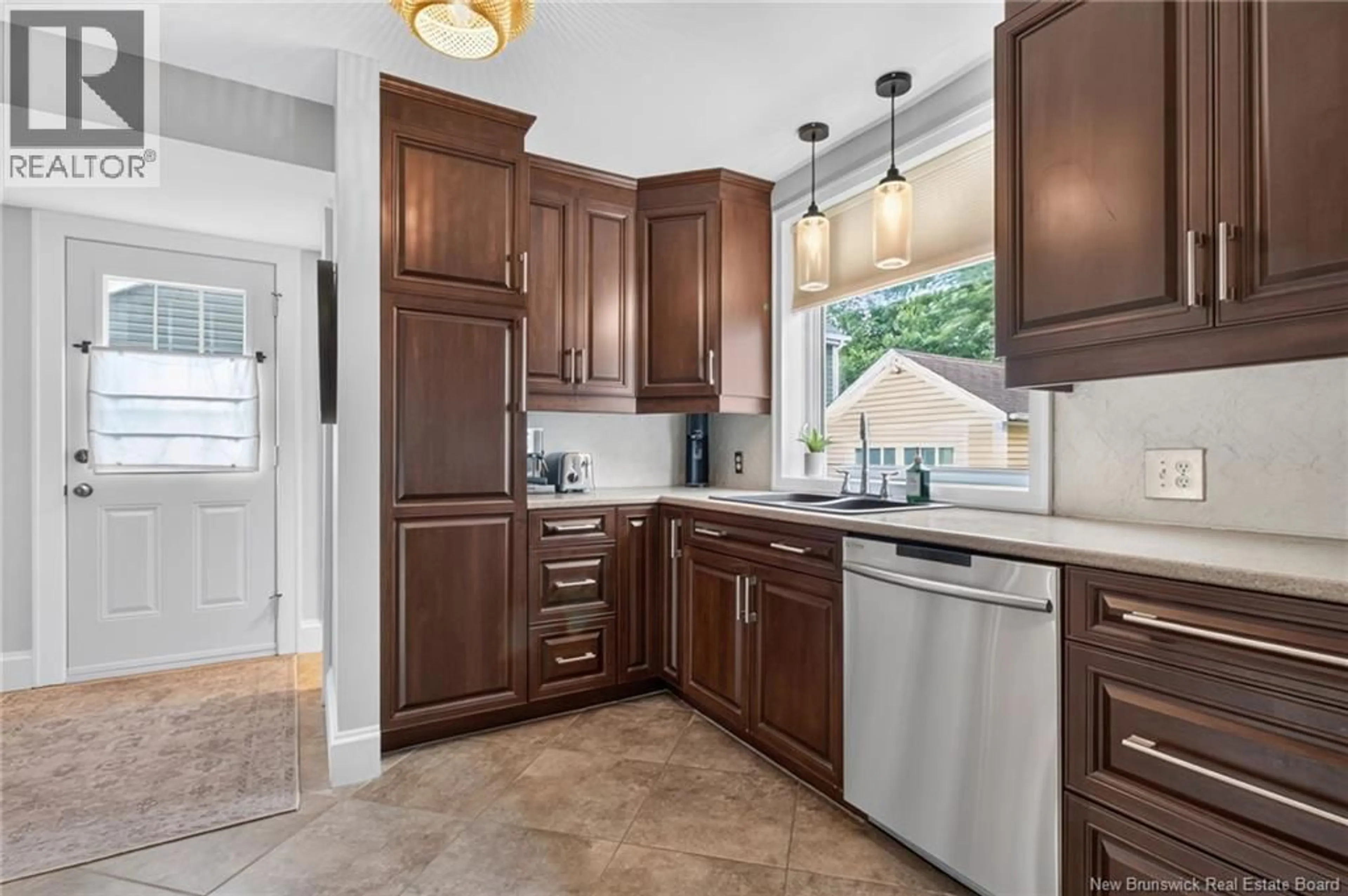 Open concept kitchen, ceramic/tile floor for 16 NORWOOD AVENUE, Moncton New Brunswick E1C6L7