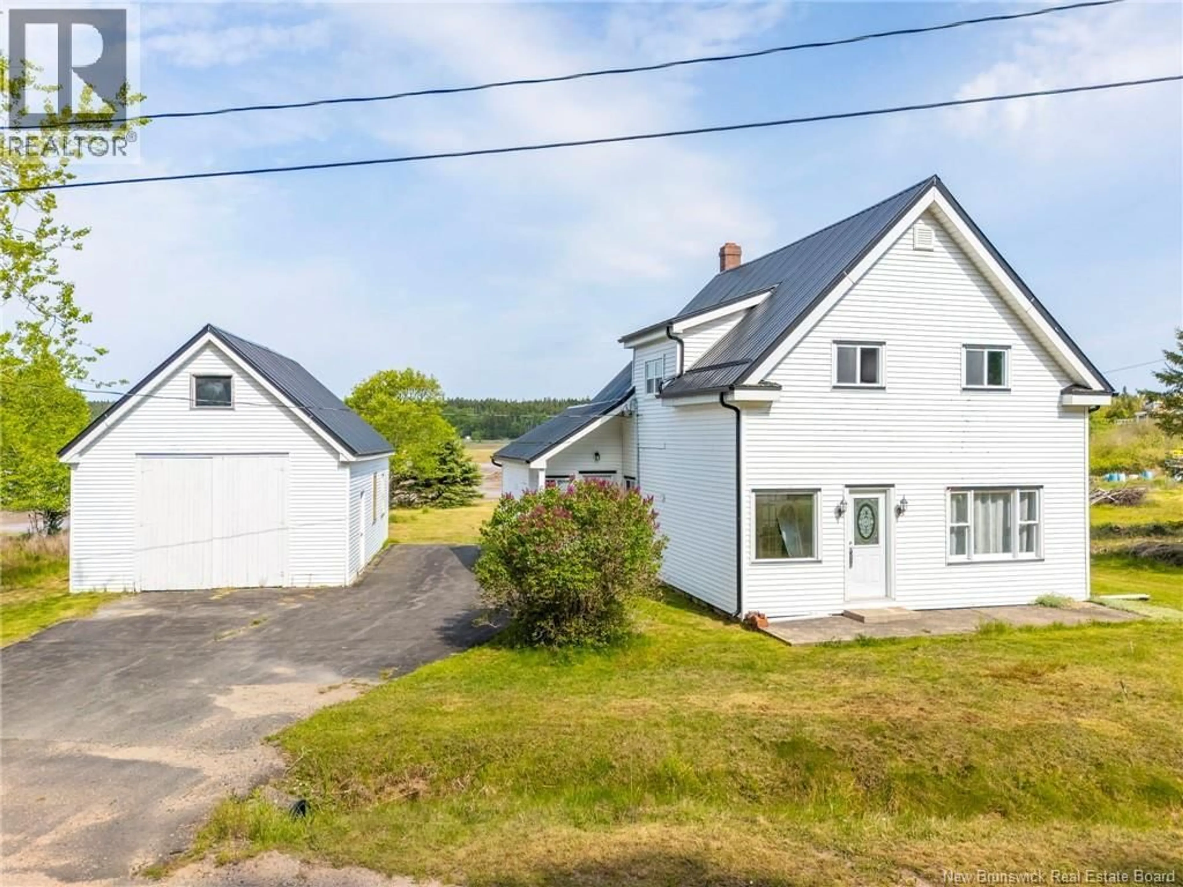 A pic from outside/outdoor area/front of a property/back of a property/a pic from drone, street for 6 CROW ISLAND ROAD, Chance Harbour New Brunswick E5J1Z8