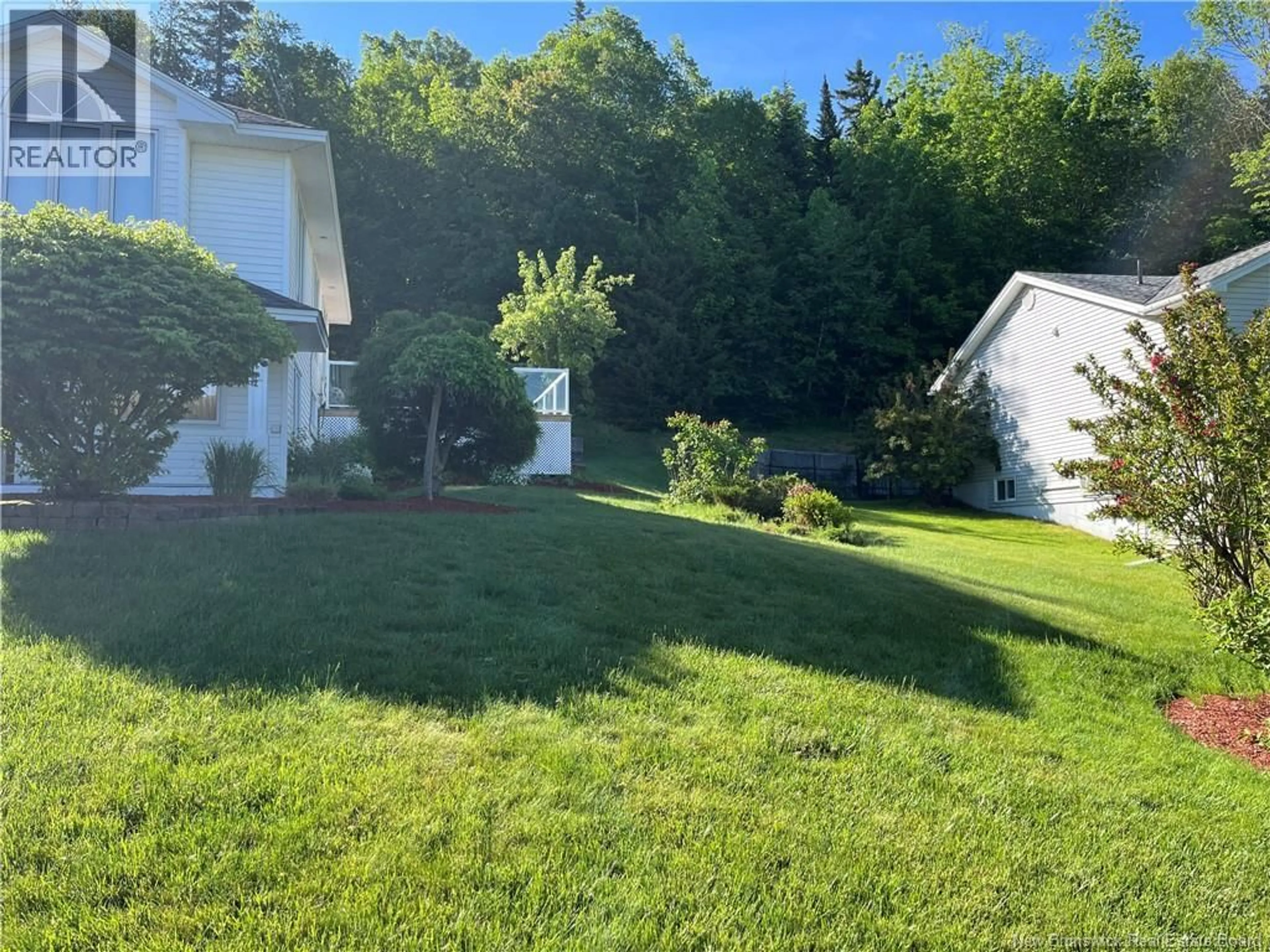 A pic from outside/outdoor area/front of a property/back of a property/a pic from drone, unknown for 38 SECOUDON DRIVE, Saint John New Brunswick E2K5G5