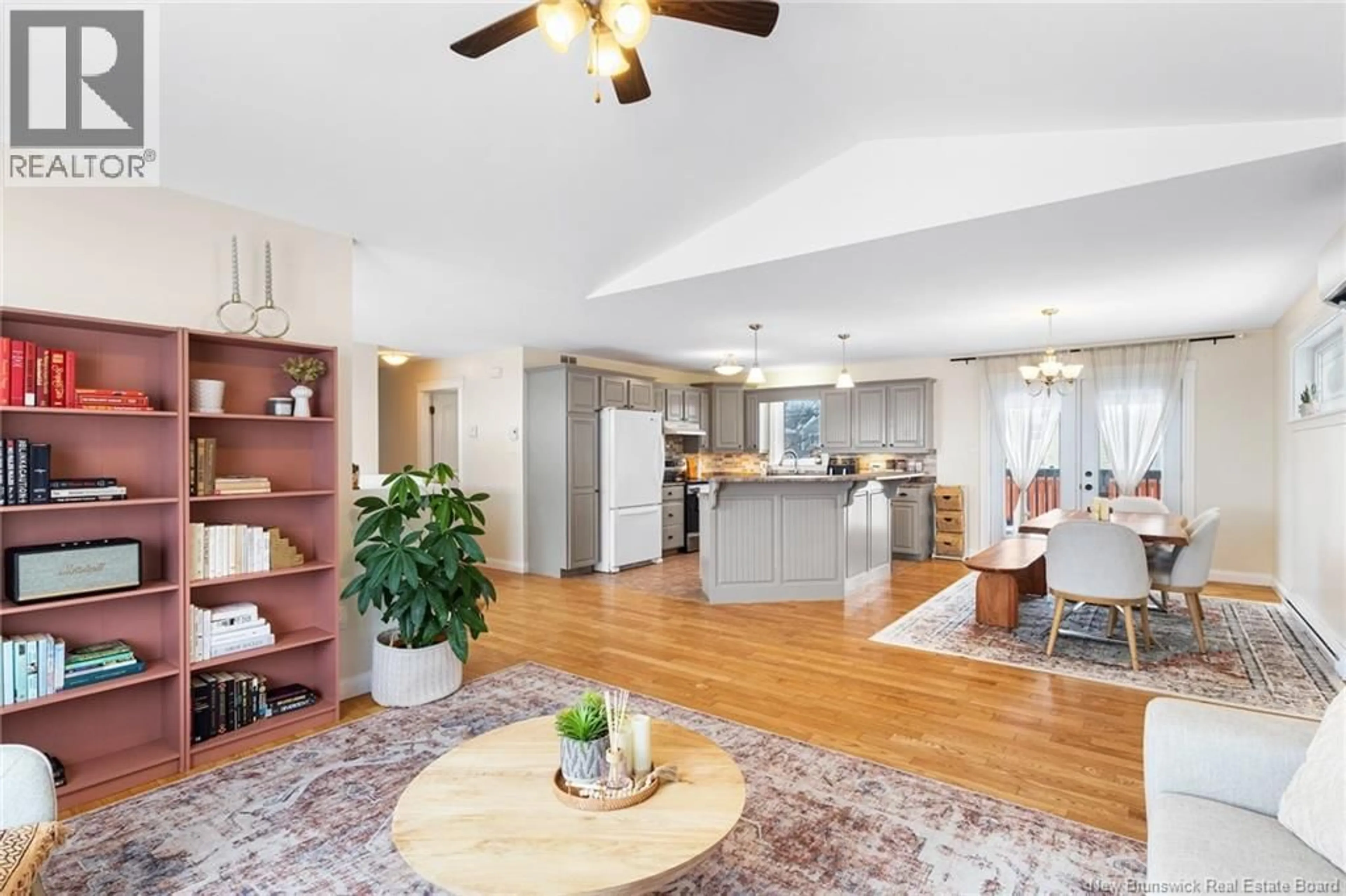 Open concept kitchen, wood/laminate floor for 13 HARRIS STREET, Oromocto New Brunswick E2V0A7