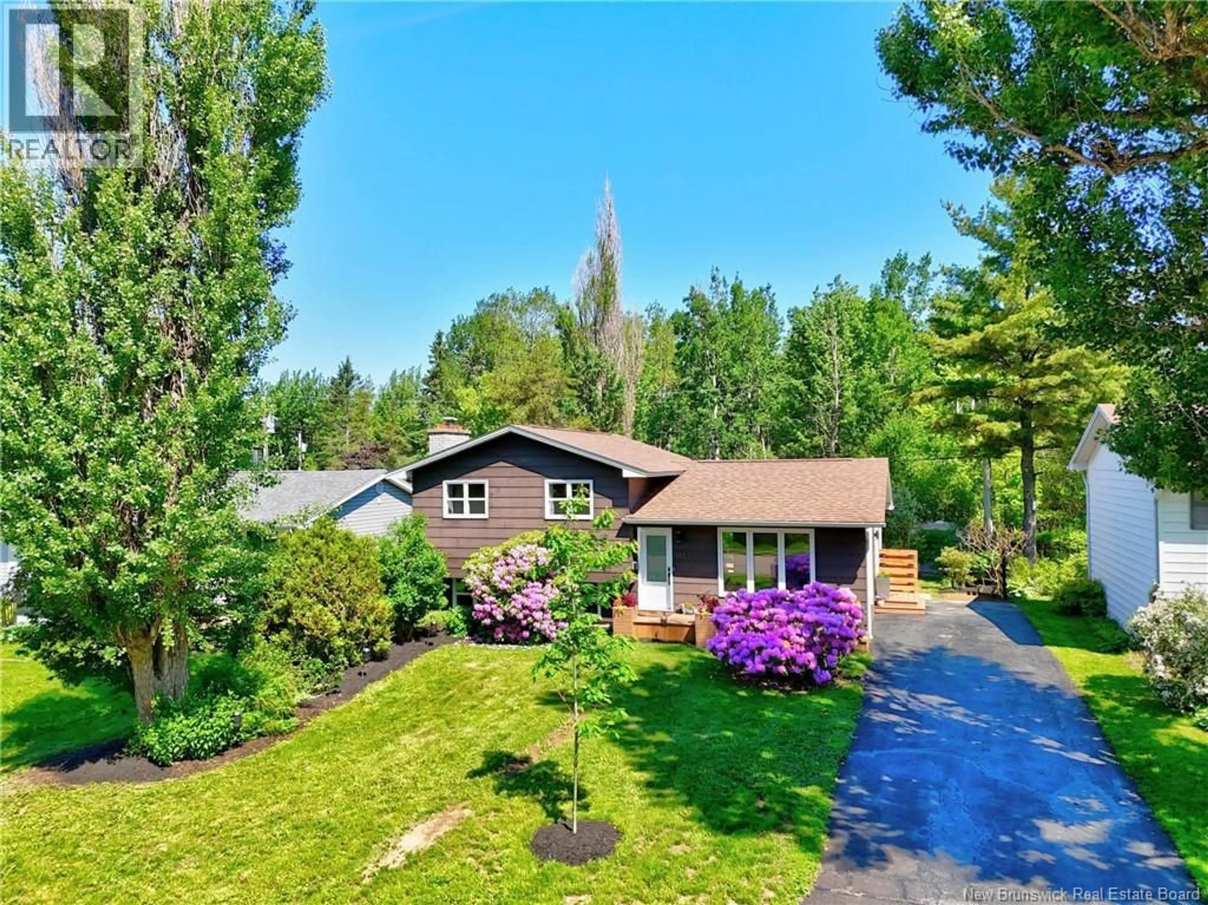 A pic from outside/outdoor area/front of a property/back of a property/a pic from drone, water/lake/river/ocean view for 163 GLENWOOD DRIVE, Moncton New Brunswick E1A2N2