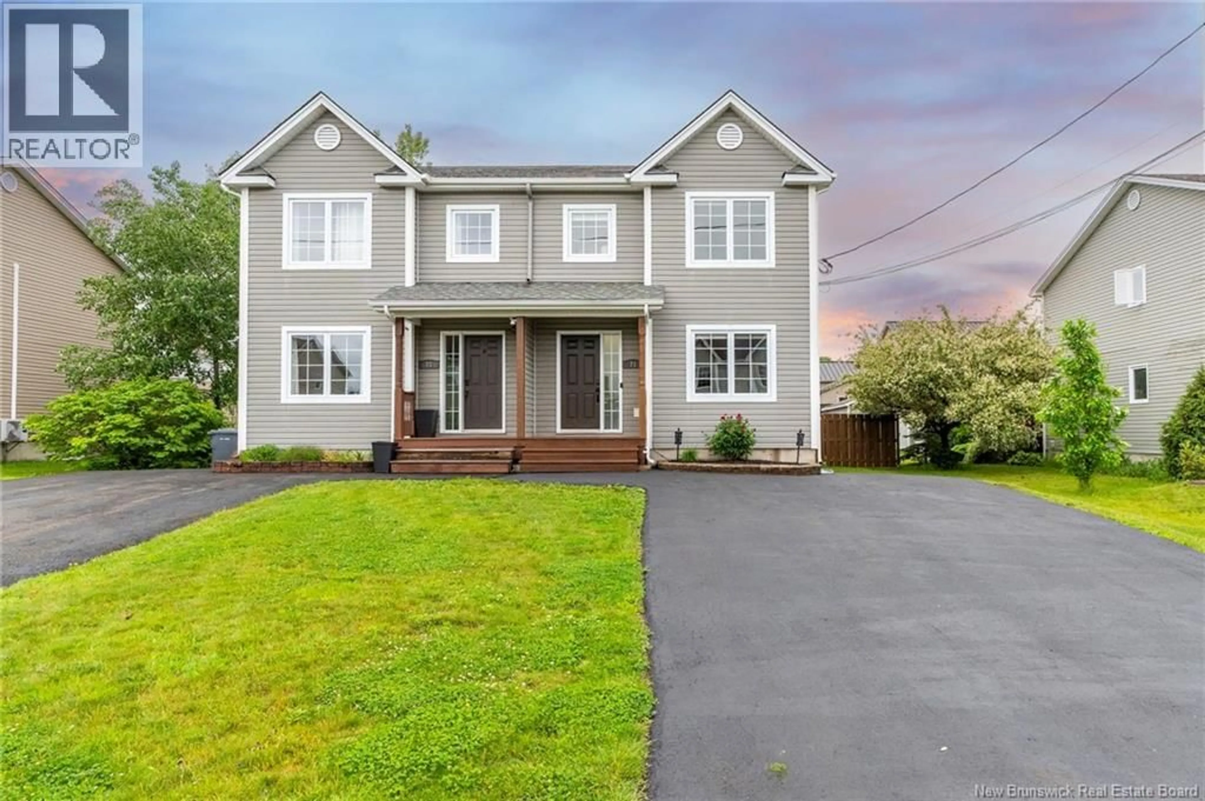Home with vinyl exterior material, street for 71 HOULAHAN STREET, Dieppe New Brunswick E1A0S9
