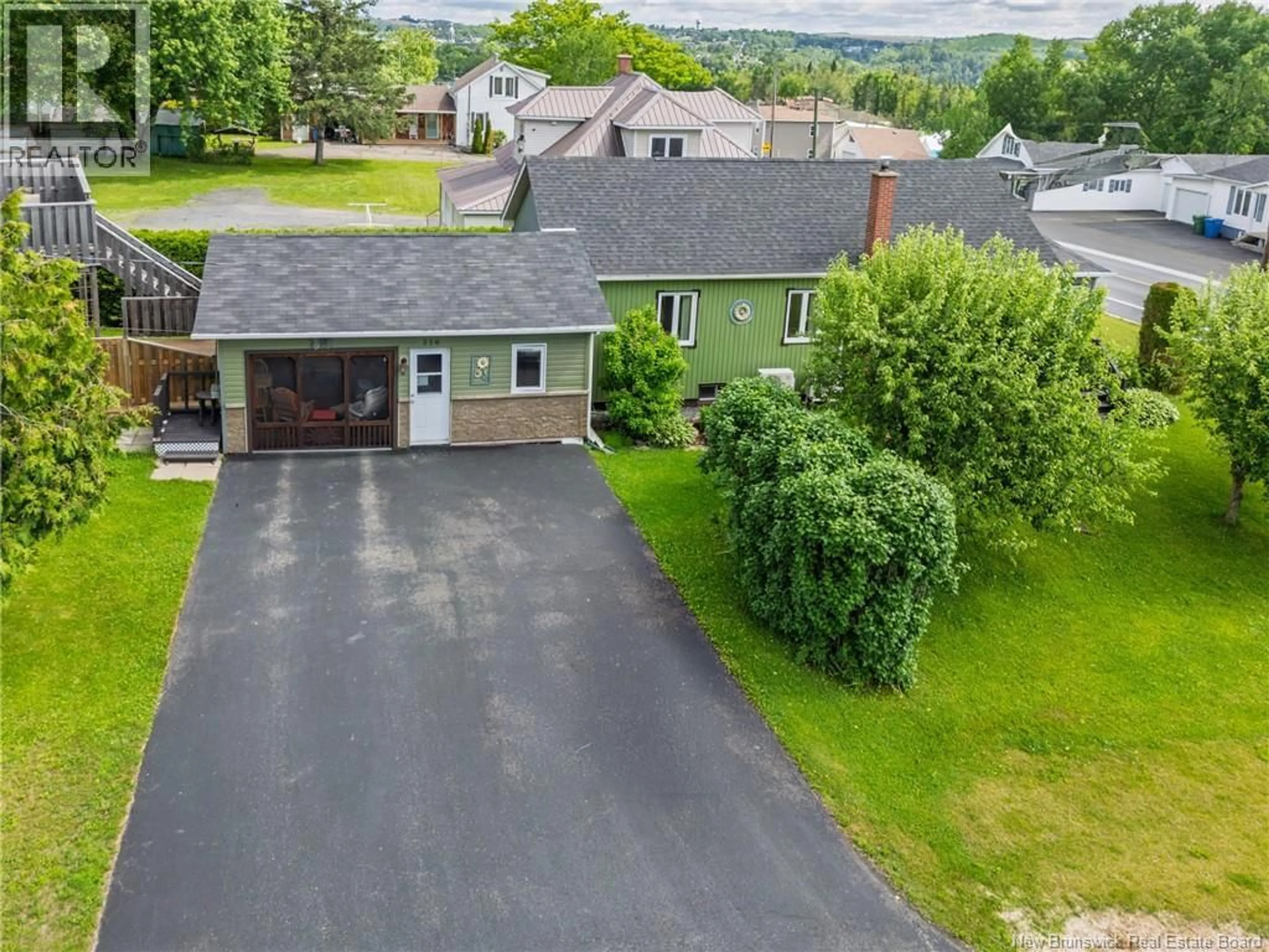 A pic from outside/outdoor area/front of a property/back of a property/a pic from drone, street for 336 PORTAGE, Grand-Sault/Grand Falls New Brunswick E3Z1M7