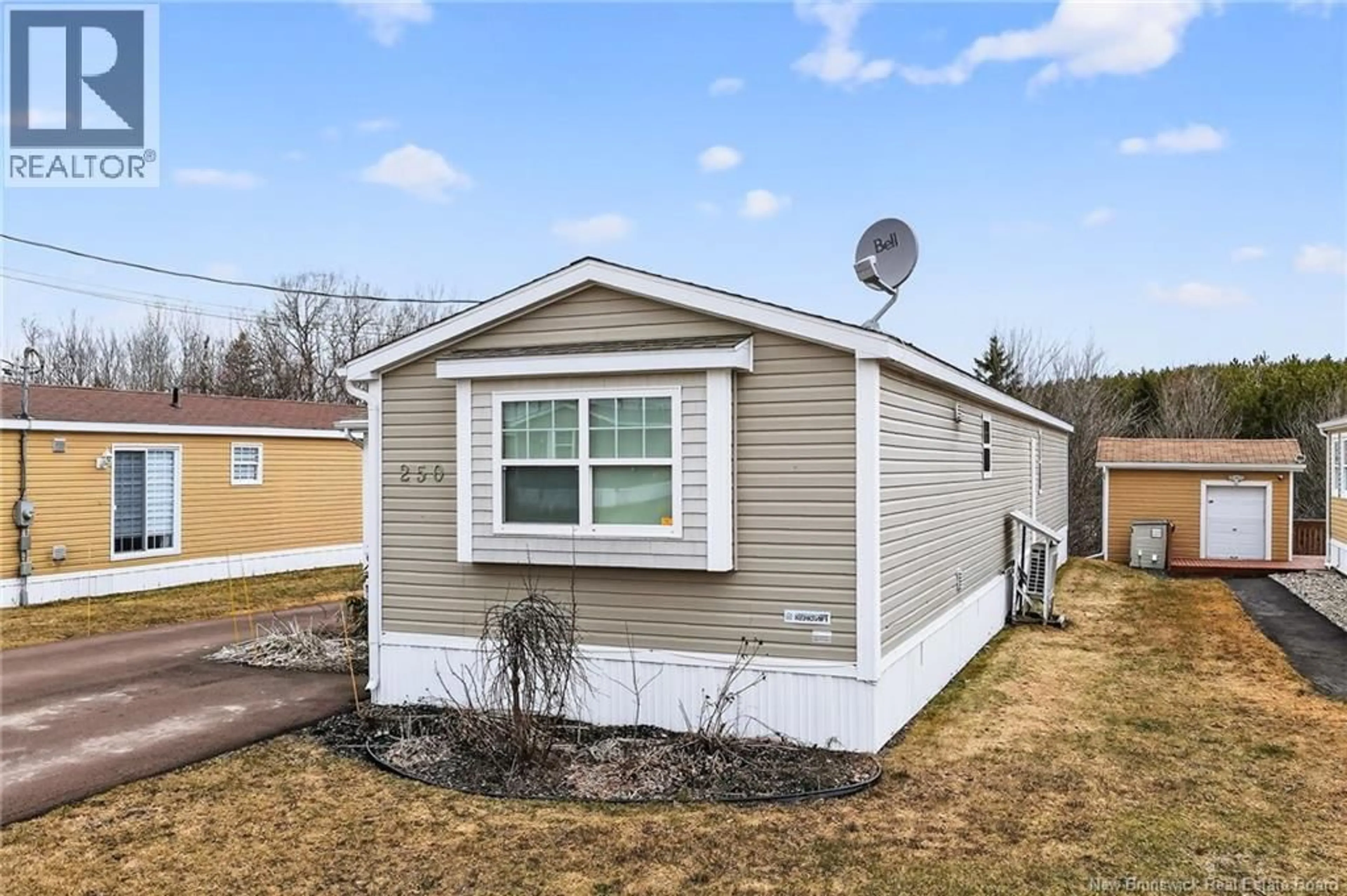 Home with vinyl exterior material, street for 250 NEPISIGUIT DRIVE, Dieppe New Brunswick E1A0P6