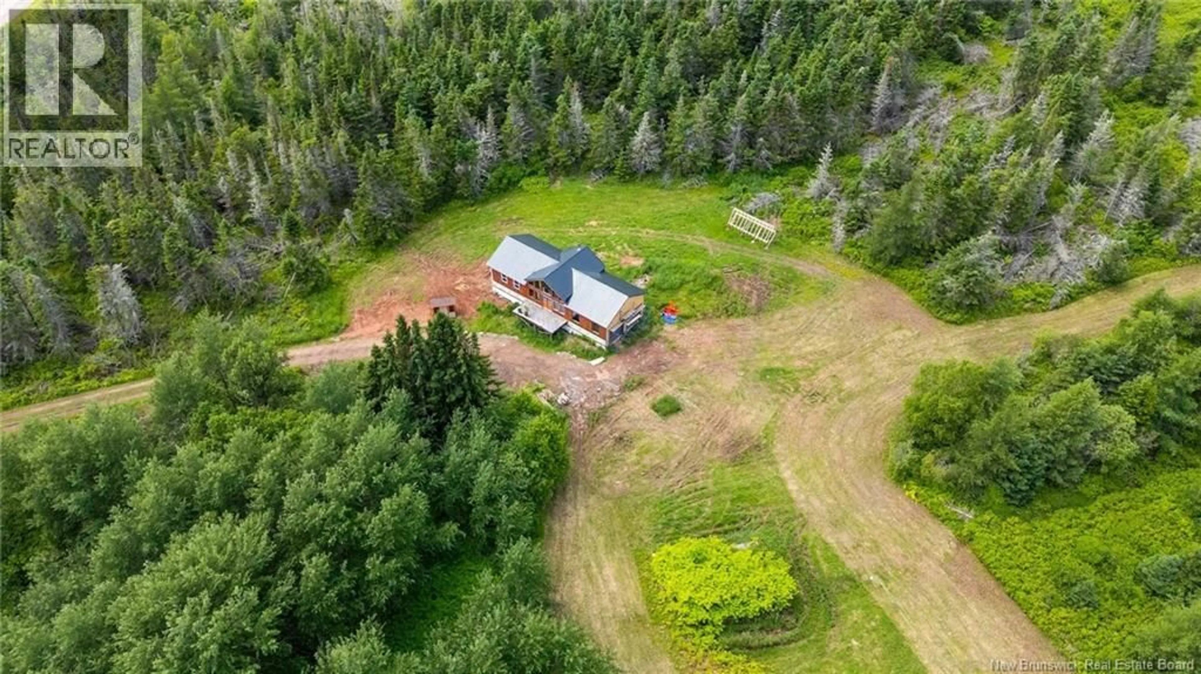A pic from outside/outdoor area/front of a property/back of a property/a pic from drone, forest/trees view for 2041 ROUTE 960, Upper Cape New Brunswick E4L1X7