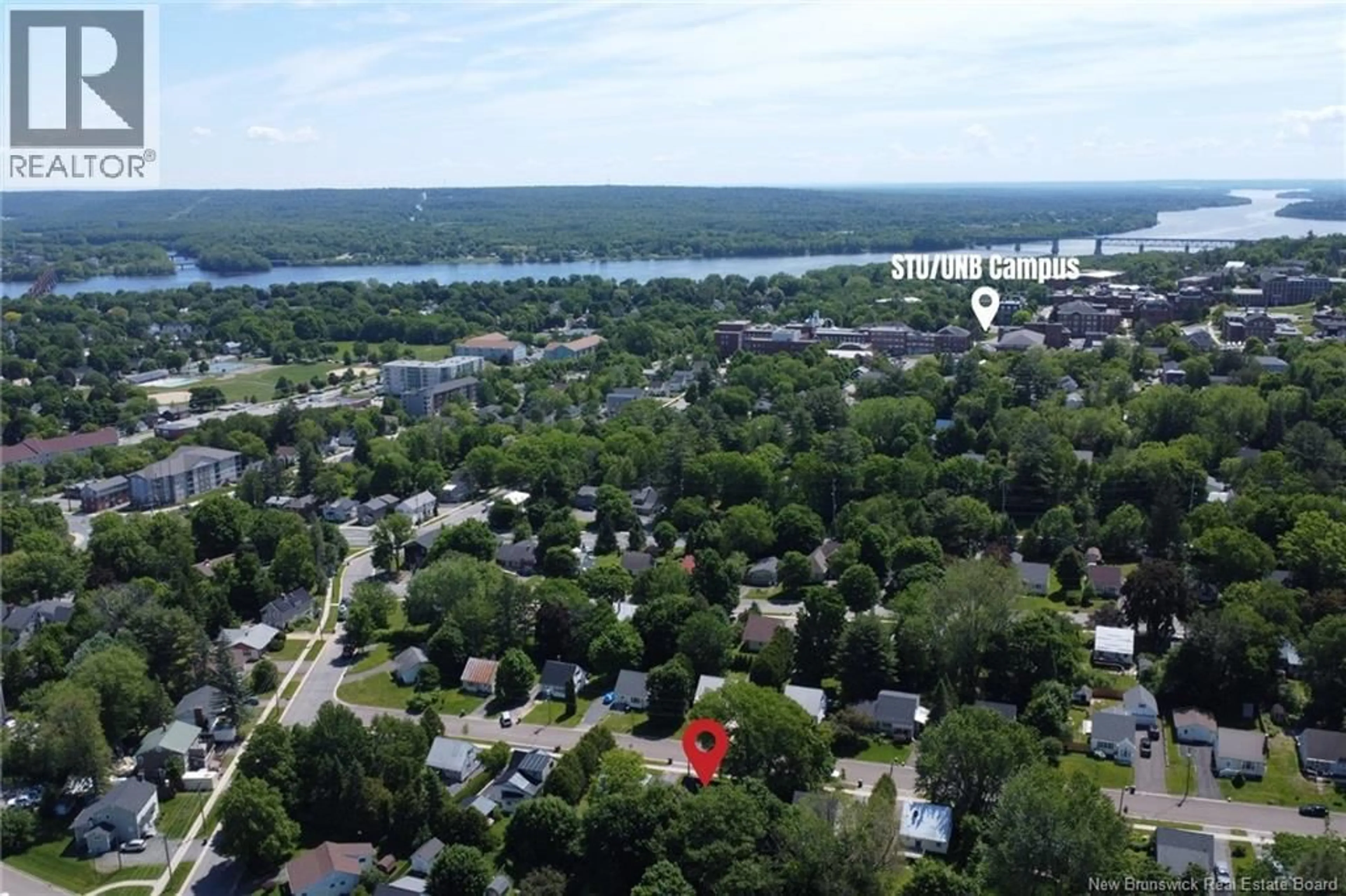 A pic from outside/outdoor area/front of a property/back of a property/a pic from drone, water/lake/river/ocean view for 623 REID STREET, Fredericton New Brunswick E3B3V6