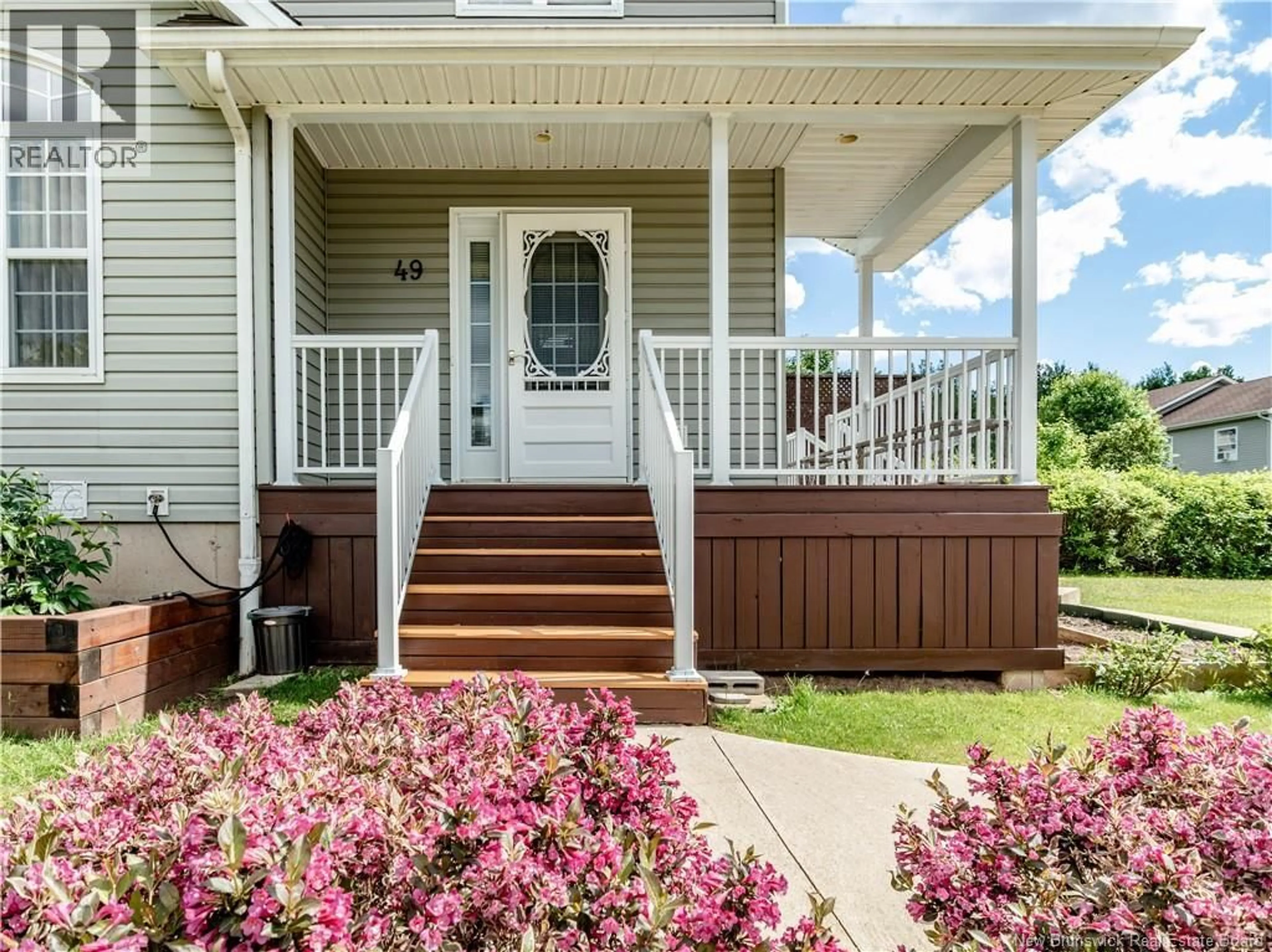 Home with vinyl exterior material, street for 49 CHARDONNAY, Dieppe New Brunswick E1A8V7