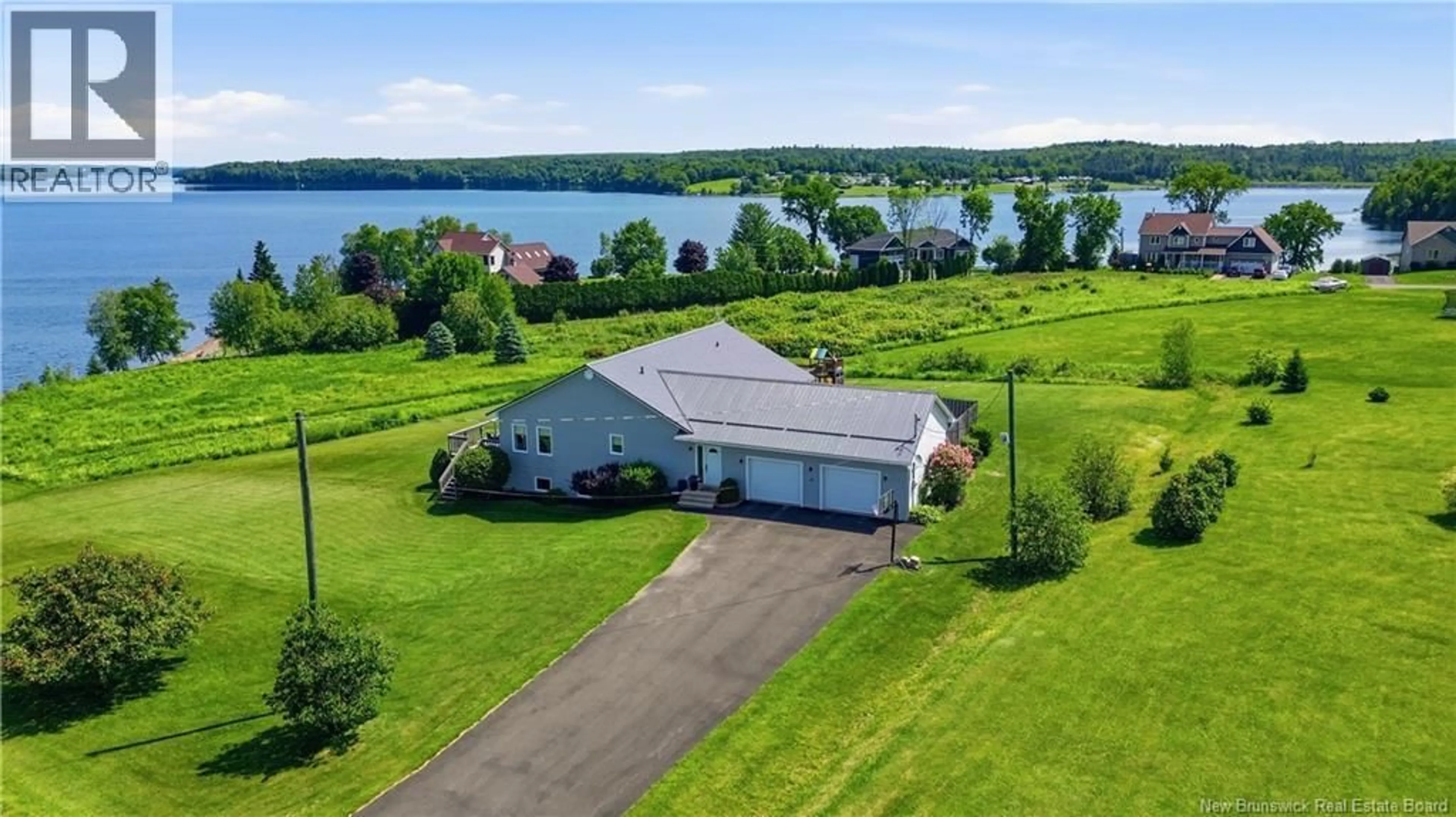 A pic from outside/outdoor area/front of a property/back of a property/a pic from drone, water/lake/river/ocean view for 10 RIPPLE LANE, Upper Kingsclear New Brunswick E3E2R6