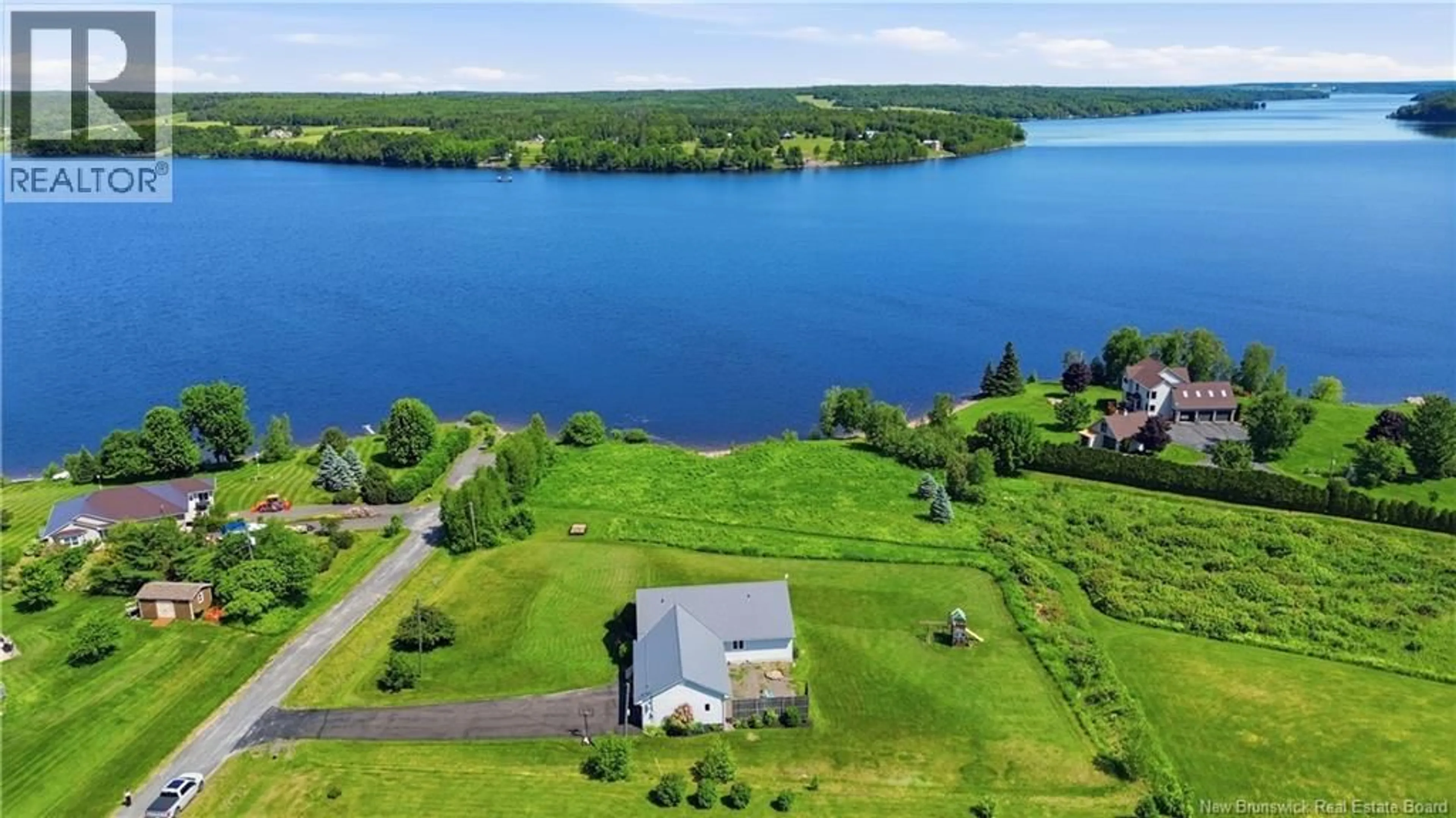A pic from outside/outdoor area/front of a property/back of a property/a pic from drone, water/lake/river/ocean view for 10 RIPPLE LANE, Upper Kingsclear New Brunswick E3E2R6