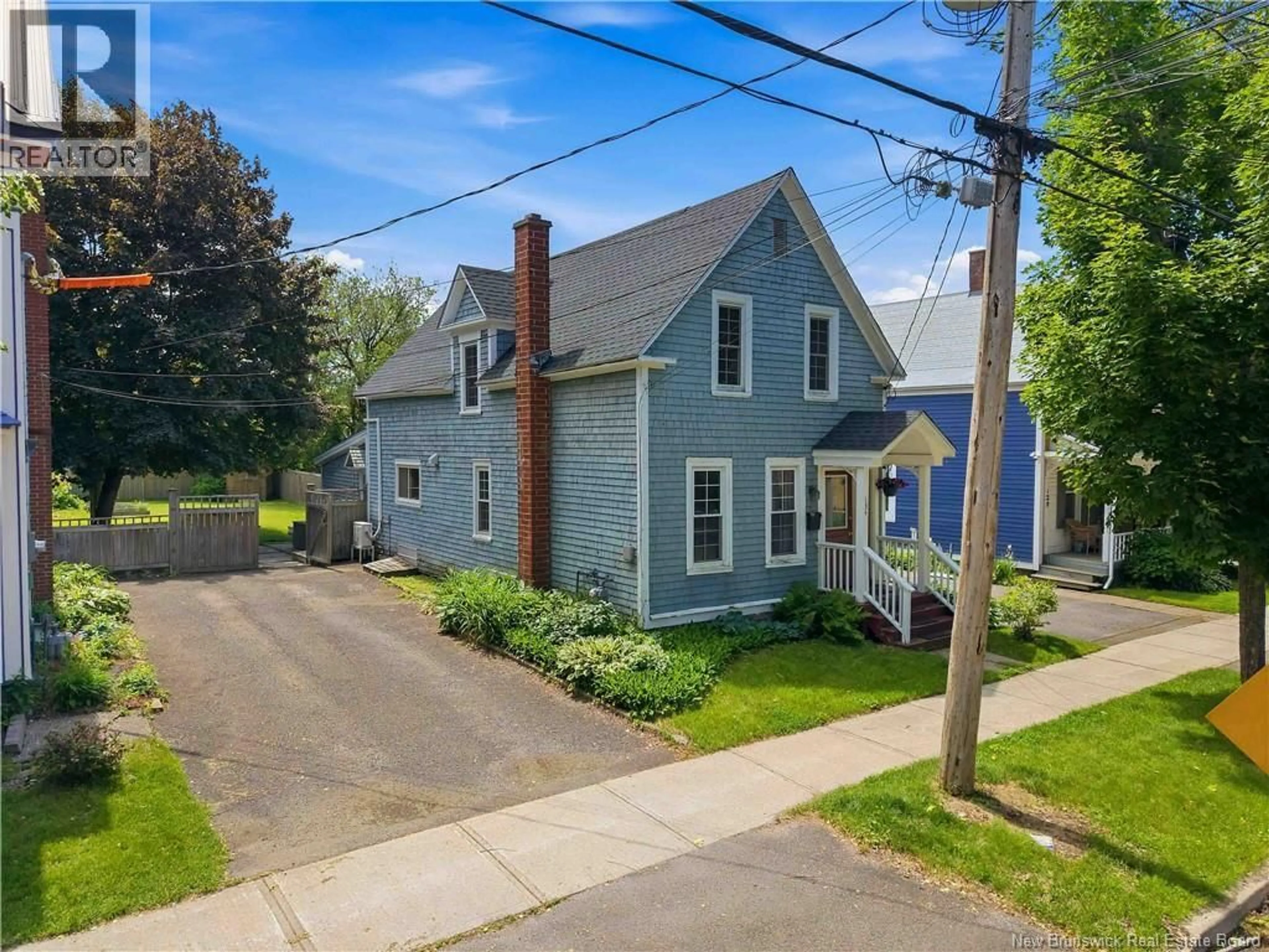 A pic from outside/outdoor area/front of a property/back of a property/a pic from drone, street for 134 CHARLOTTE STREET, Fredericton New Brunswick E3B1L2