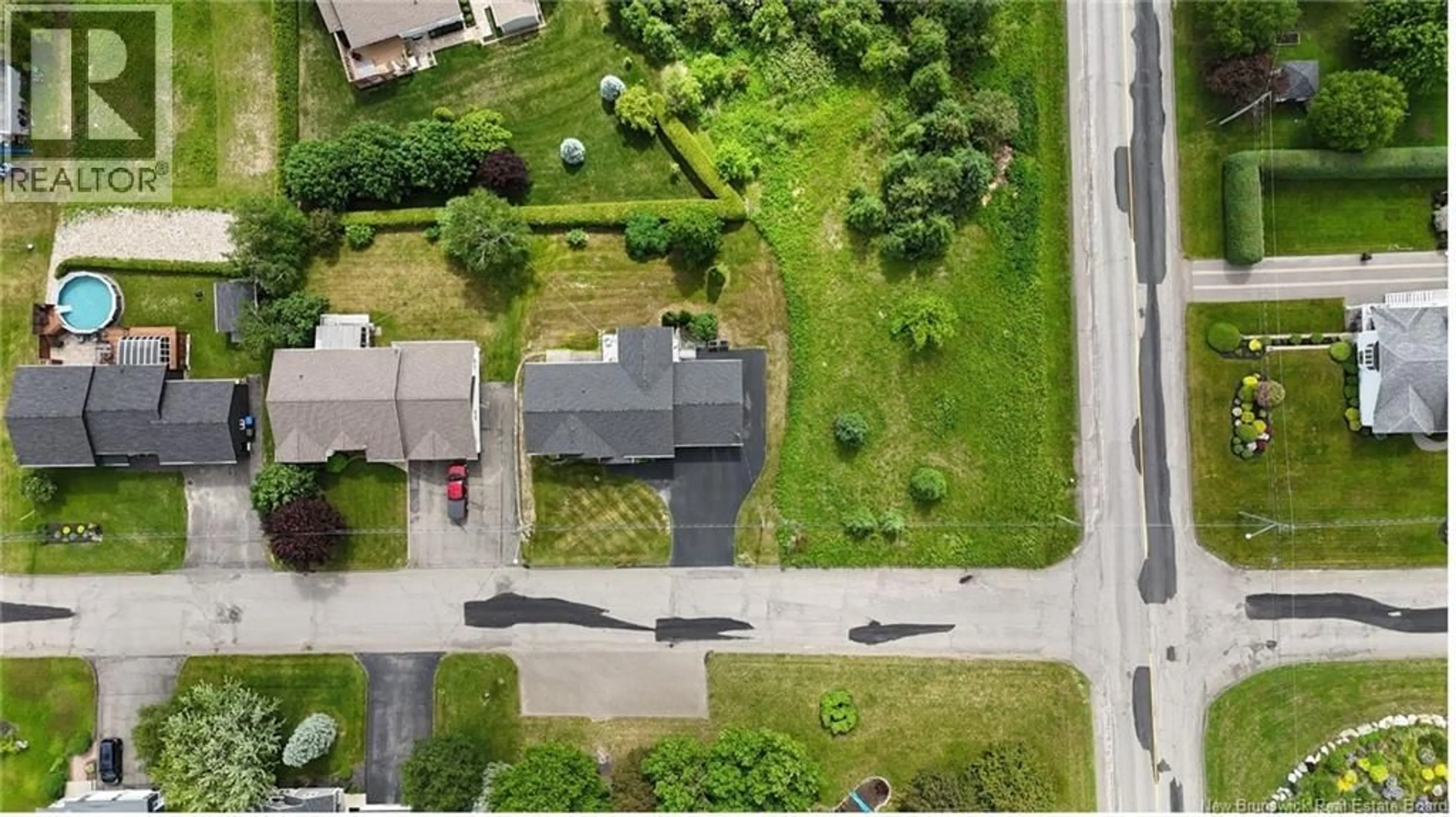 A pic from outside/outdoor area/front of a property/back of a property/a pic from drone, street for 56 WILSON CRESCENT, Grand Falls New Brunswick E3Y1G3