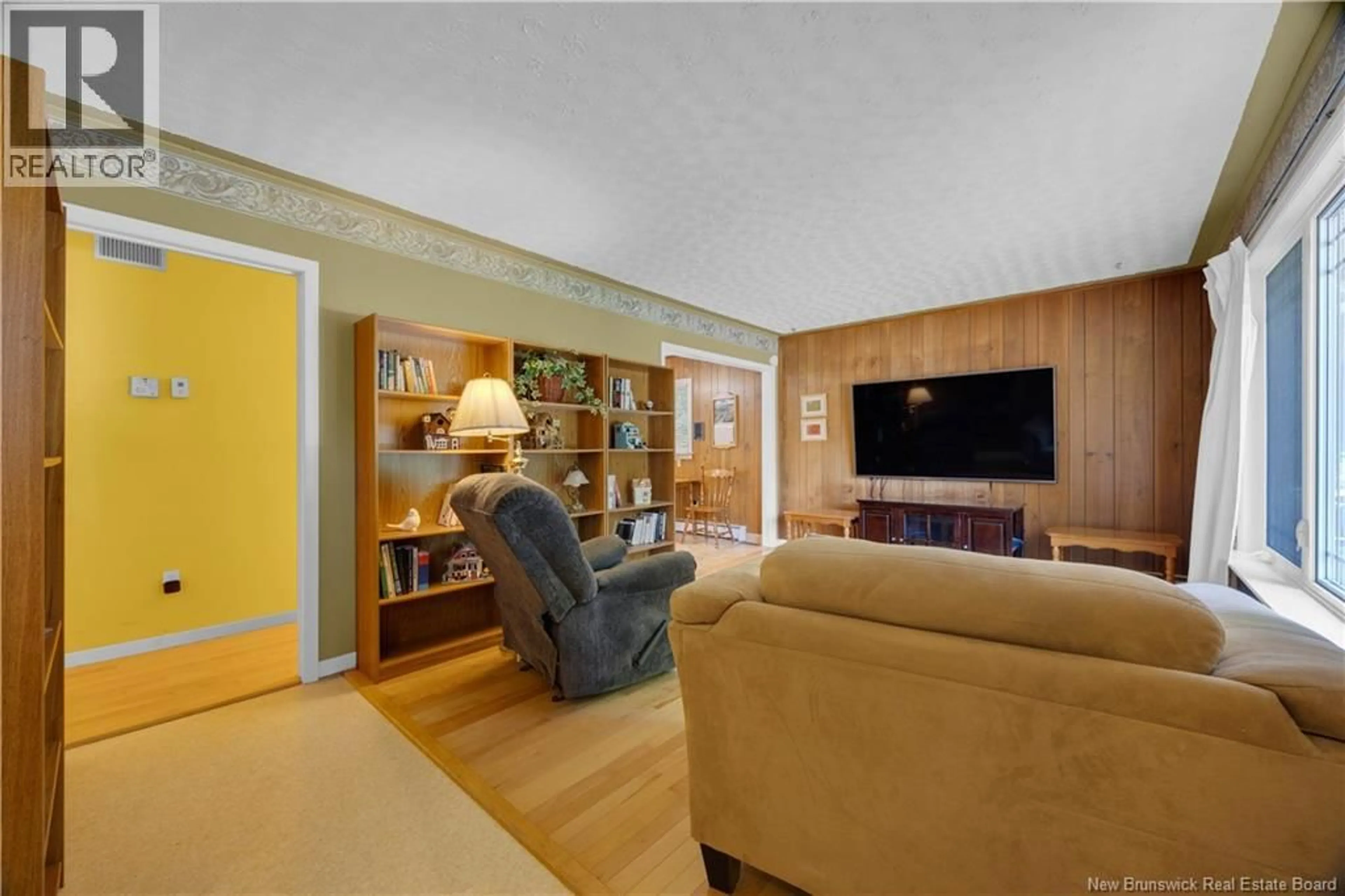 Living room with furniture, wood/laminate floor for 14 RIVER ROAD, Rothesay New Brunswick E2E2C4