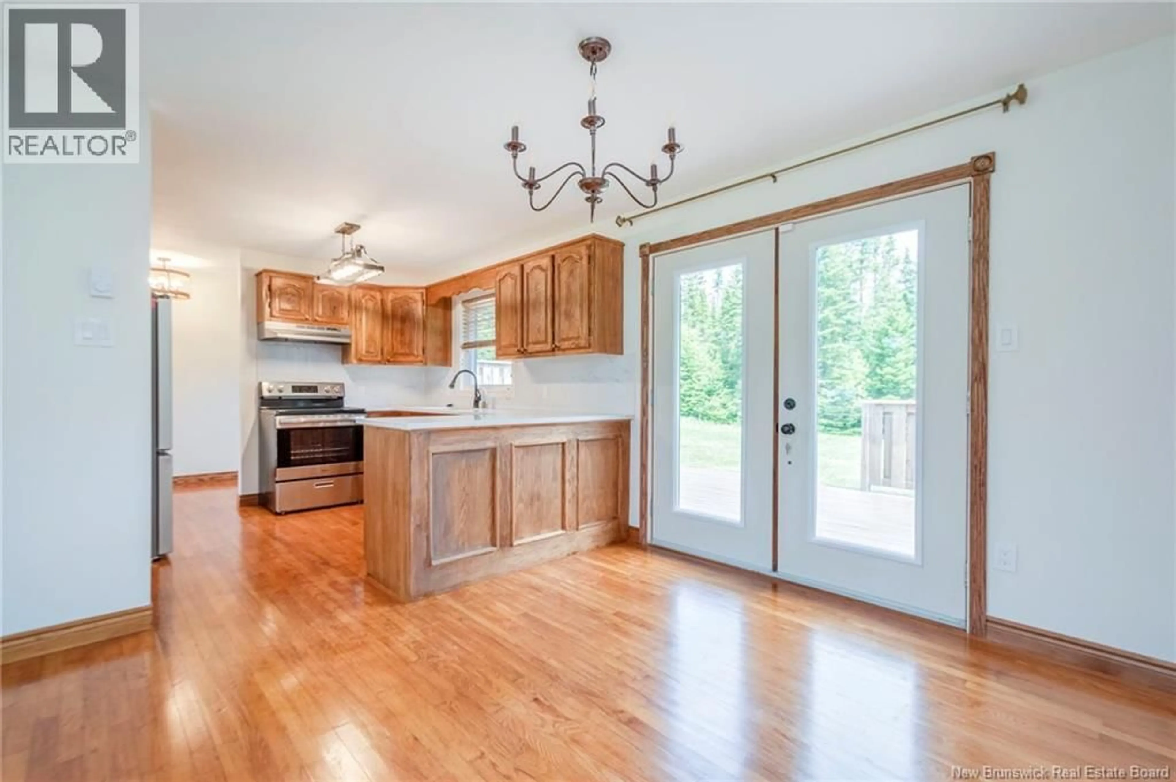 Open concept kitchen, wood/laminate floor for 20 MARILYN DRIVE, Saint John New Brunswick E2N1S5