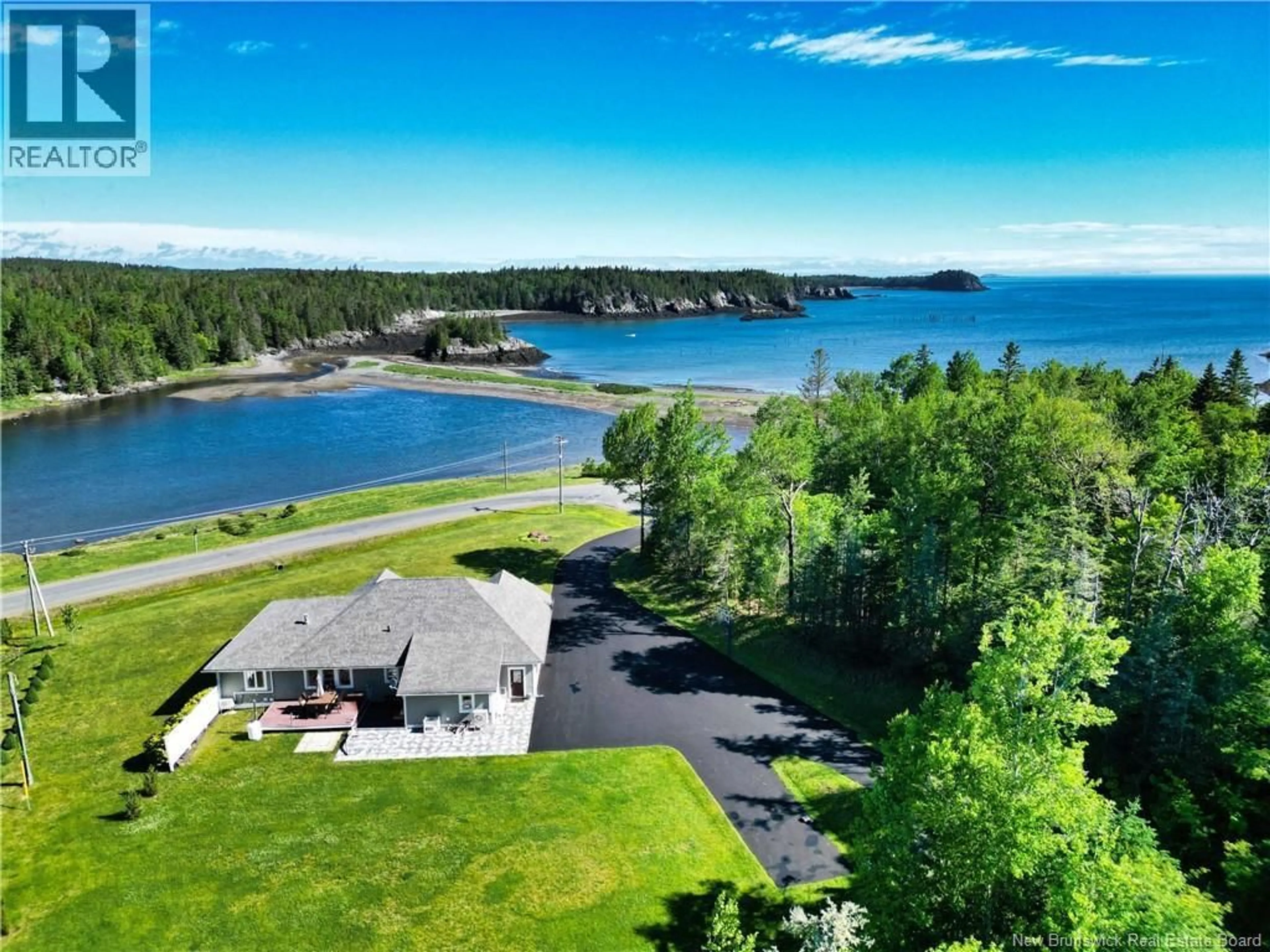 A pic from outside/outdoor area/front of a property/back of a property/a pic from drone, water/lake/river/ocean view for 905 FUNDY DRIVE, Wilsons Beach New Brunswick E5E1Y5
