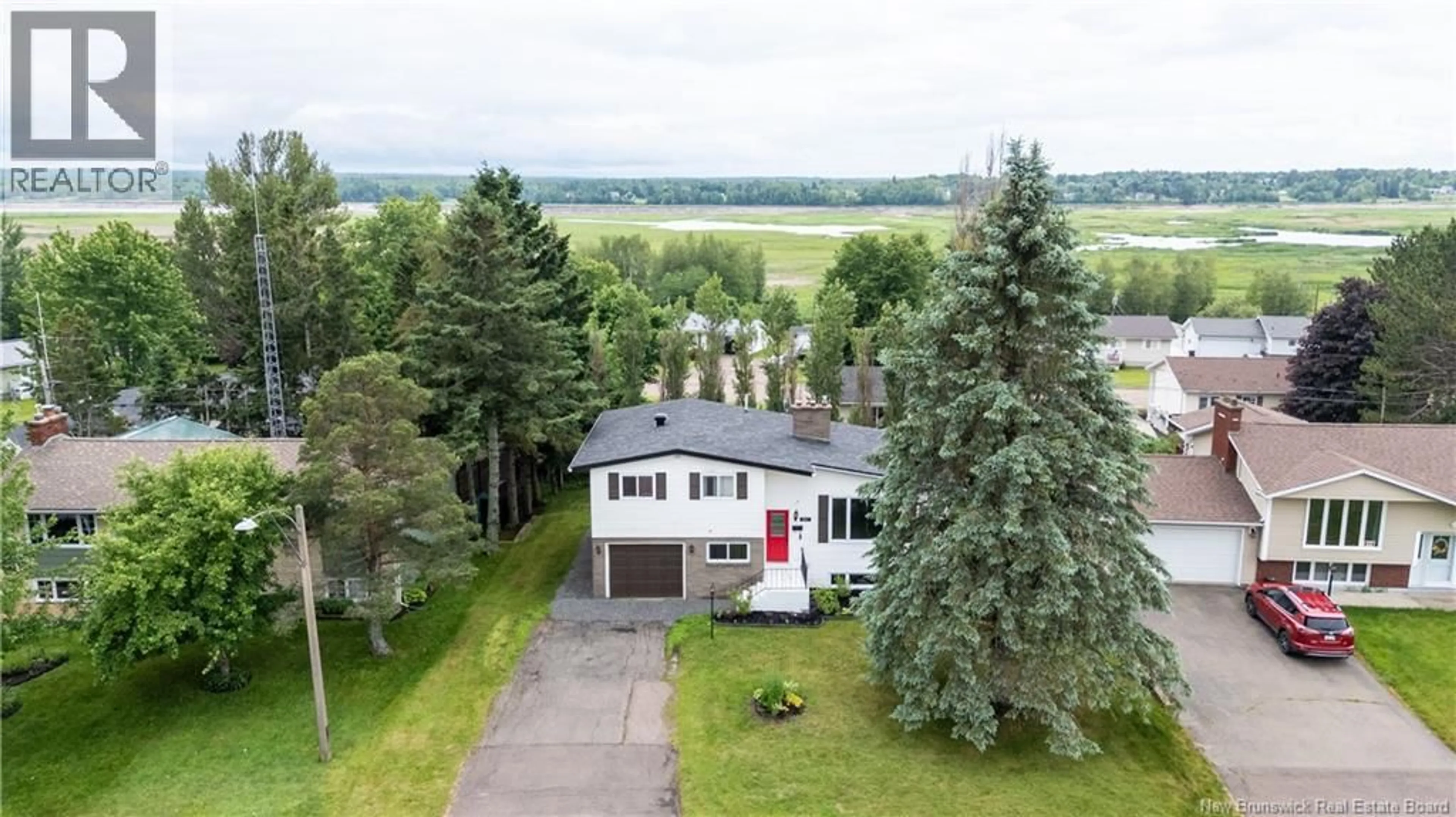 A pic from outside/outdoor area/front of a property/back of a property/a pic from drone, water/lake/river/ocean view for 641 CHARLINE AVENUE, Dieppe New Brunswick E1A1C7