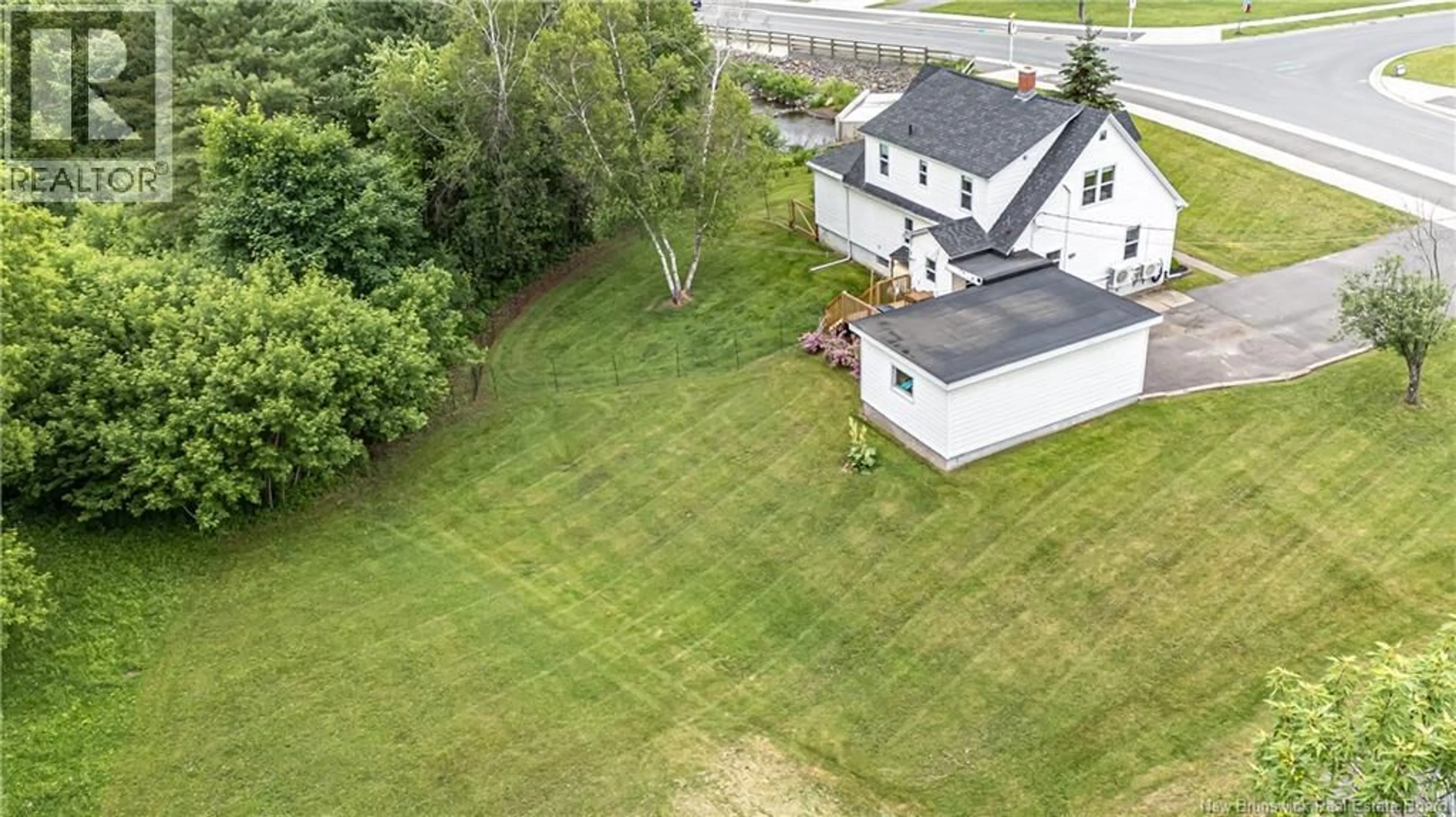 A pic from outside/outdoor area/front of a property/back of a property/a pic from drone, unknown for 154 BROOKSIDE DRIVE, Fredericton New Brunswick E3A1T6