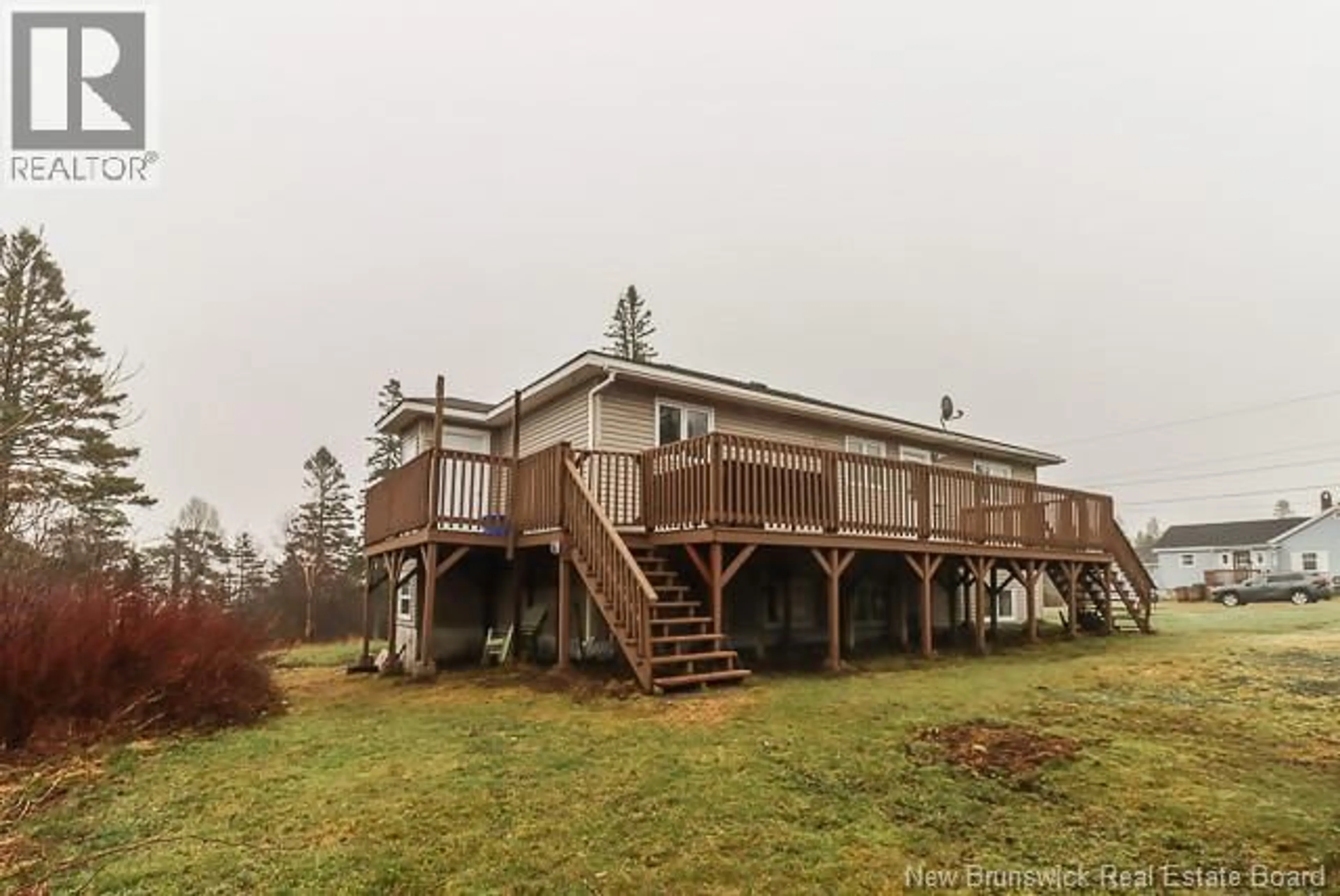 A pic from outside/outdoor area/front of a property/back of a property/a pic from drone, water/lake/river/ocean view for 15 ROSE POINT LANE, Saint John New Brunswick E2M7J8