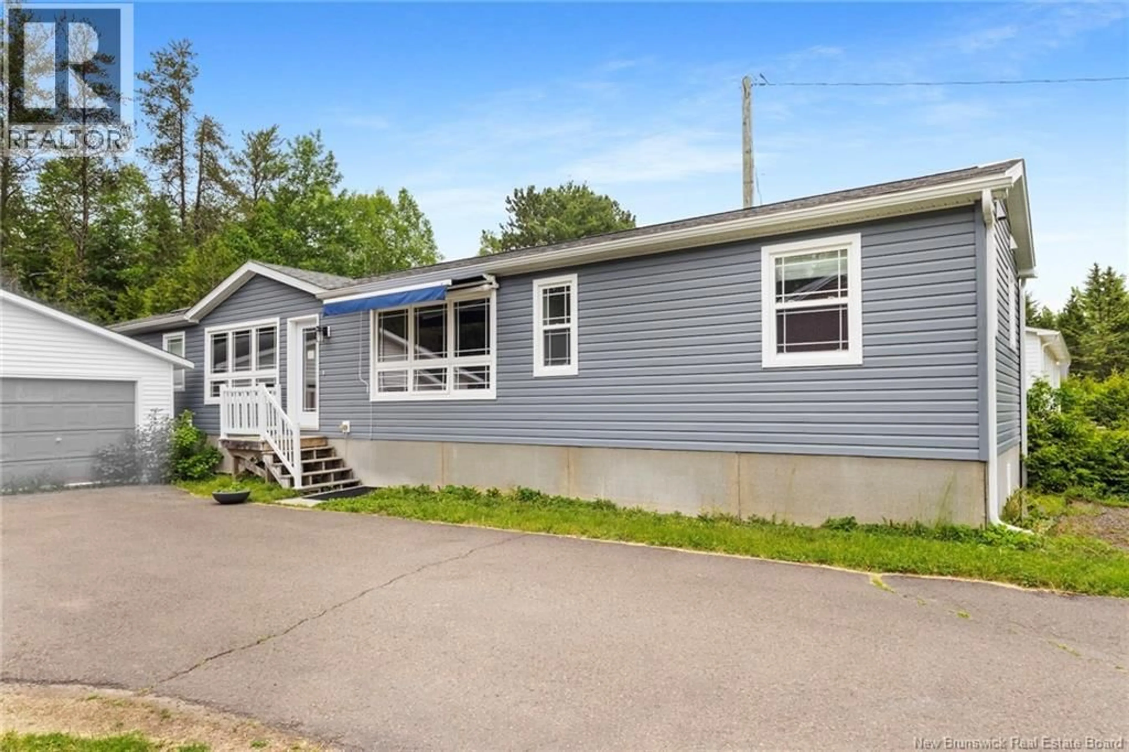 Home with vinyl exterior material, street for 70 BIRCH STREET, Minto New Brunswick E4B3L8