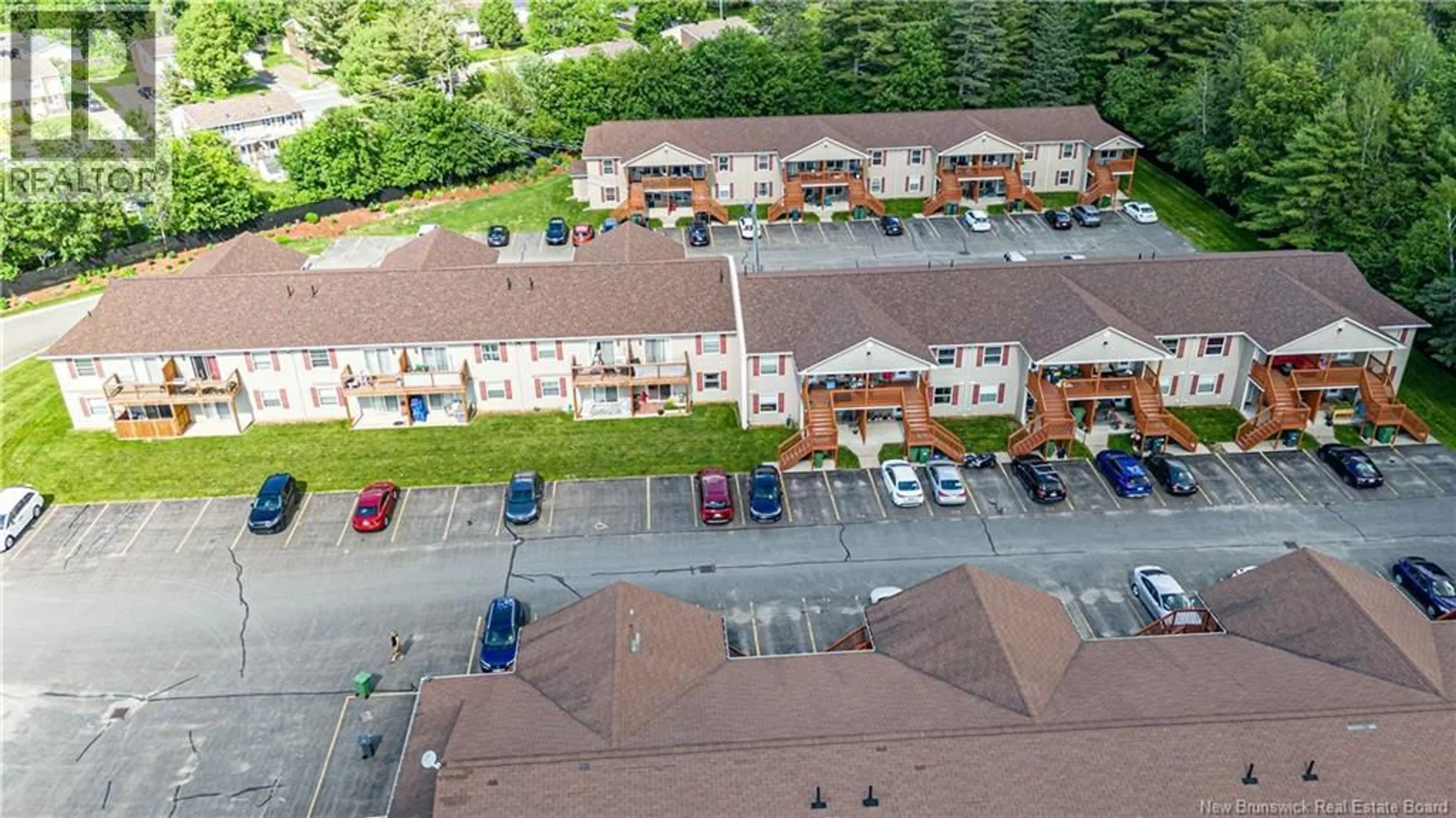 A pic from outside/outdoor area/front of a property/back of a property/a pic from drone, mountain view for 67 - 25 TRAILSIDE LANE, Fredericton New Brunswick E3A5M3