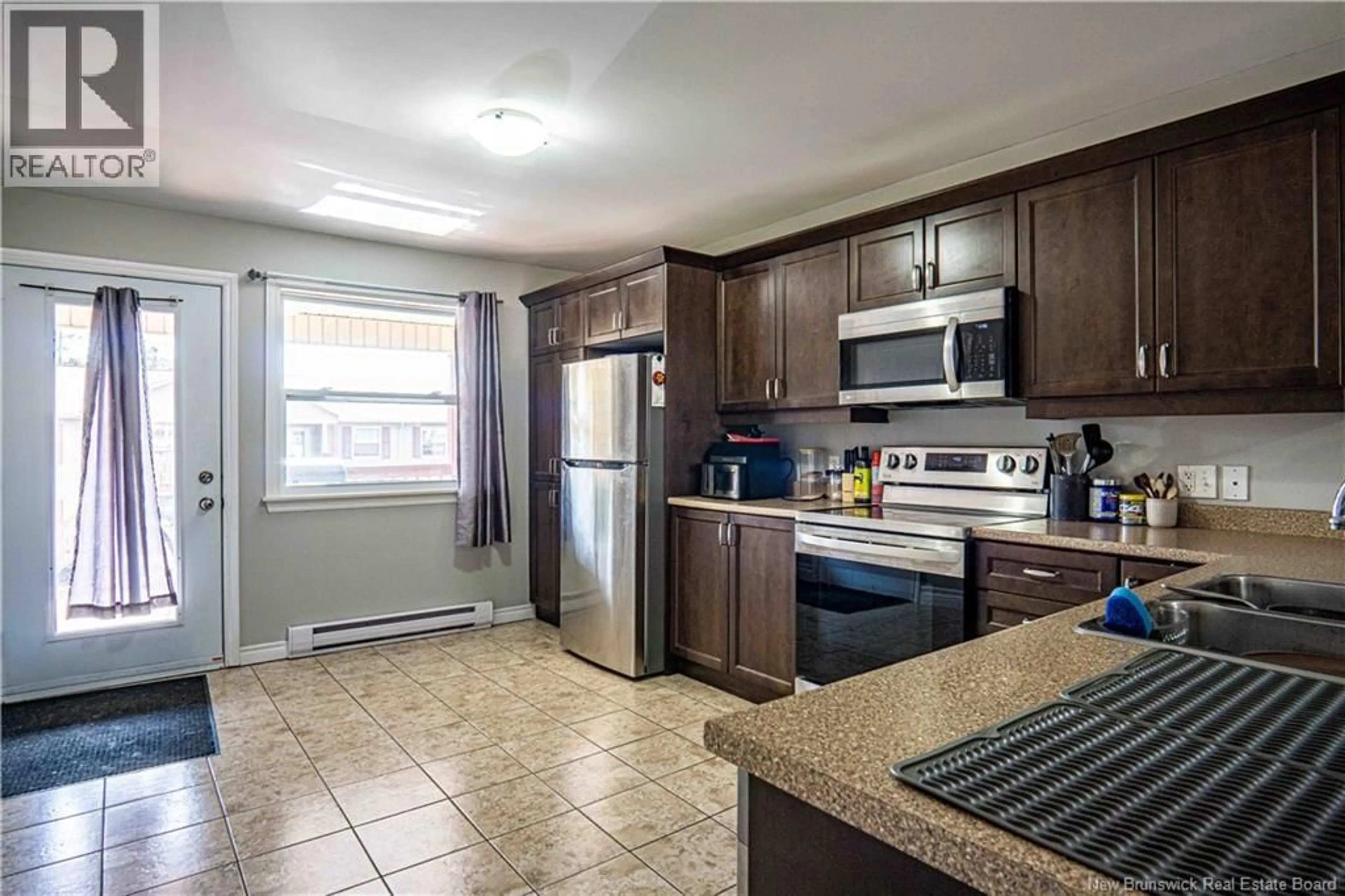 Standard kitchen, ceramic/tile floor for 67 - 25 TRAILSIDE LANE, Fredericton New Brunswick E3A5M3