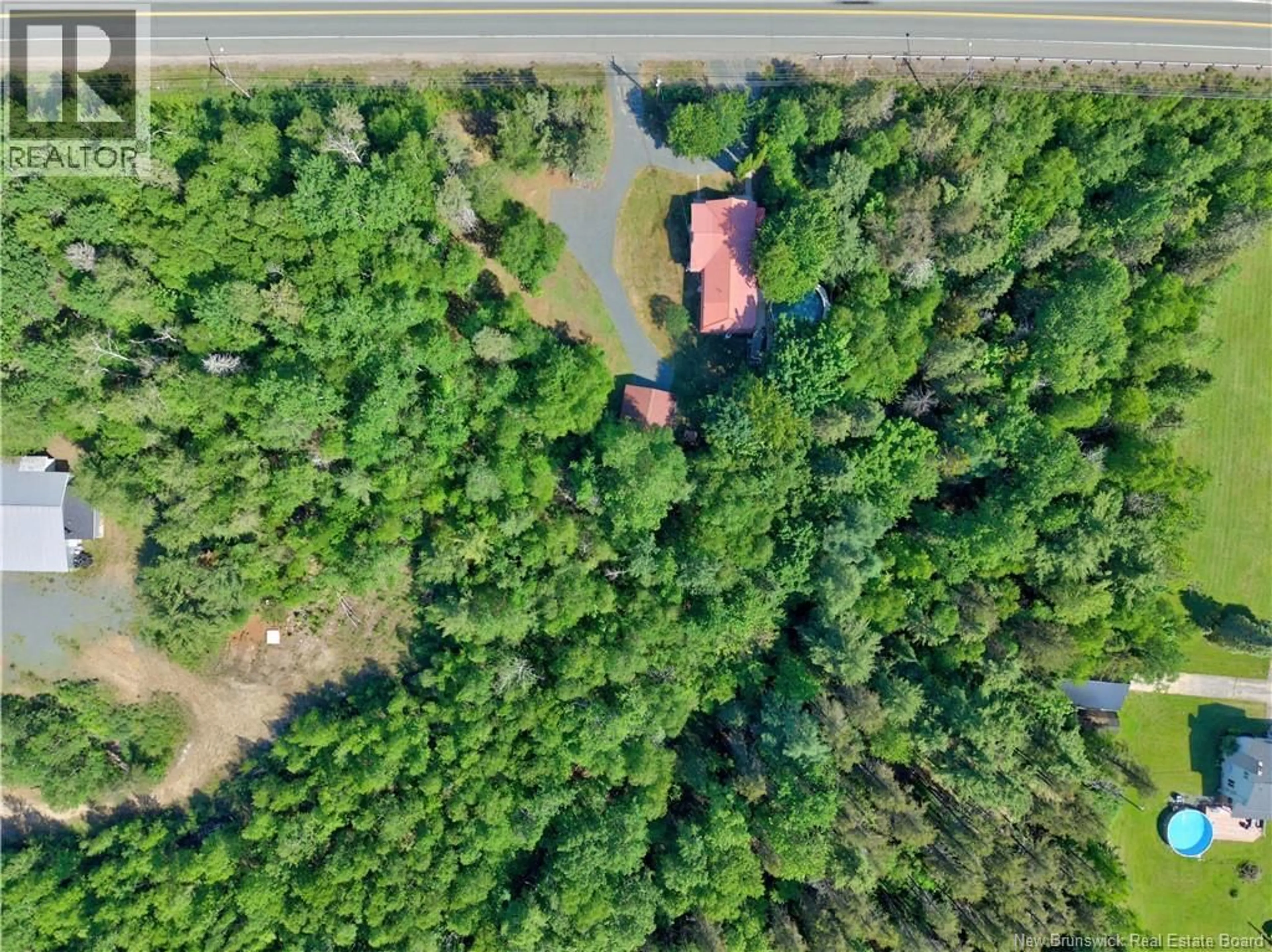 A pic from outside/outdoor area/front of a property/back of a property/a pic from drone, forest/trees view for 3168 KING GEORGE HWY, Miramichi New Brunswick E1V7B9