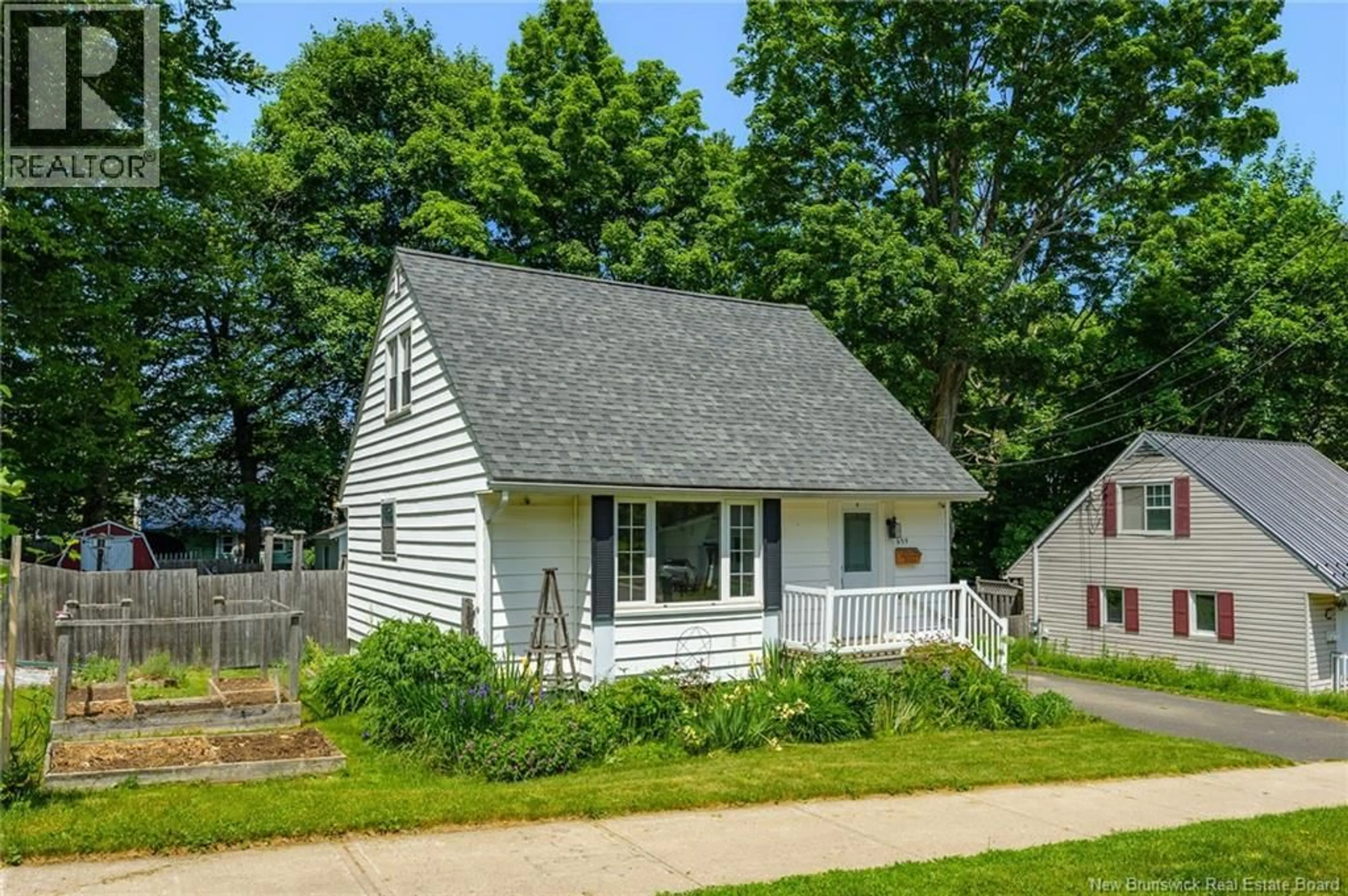 Home with vinyl exterior material, street for 695 REID STREET, Fredericton New Brunswick E3B3V6