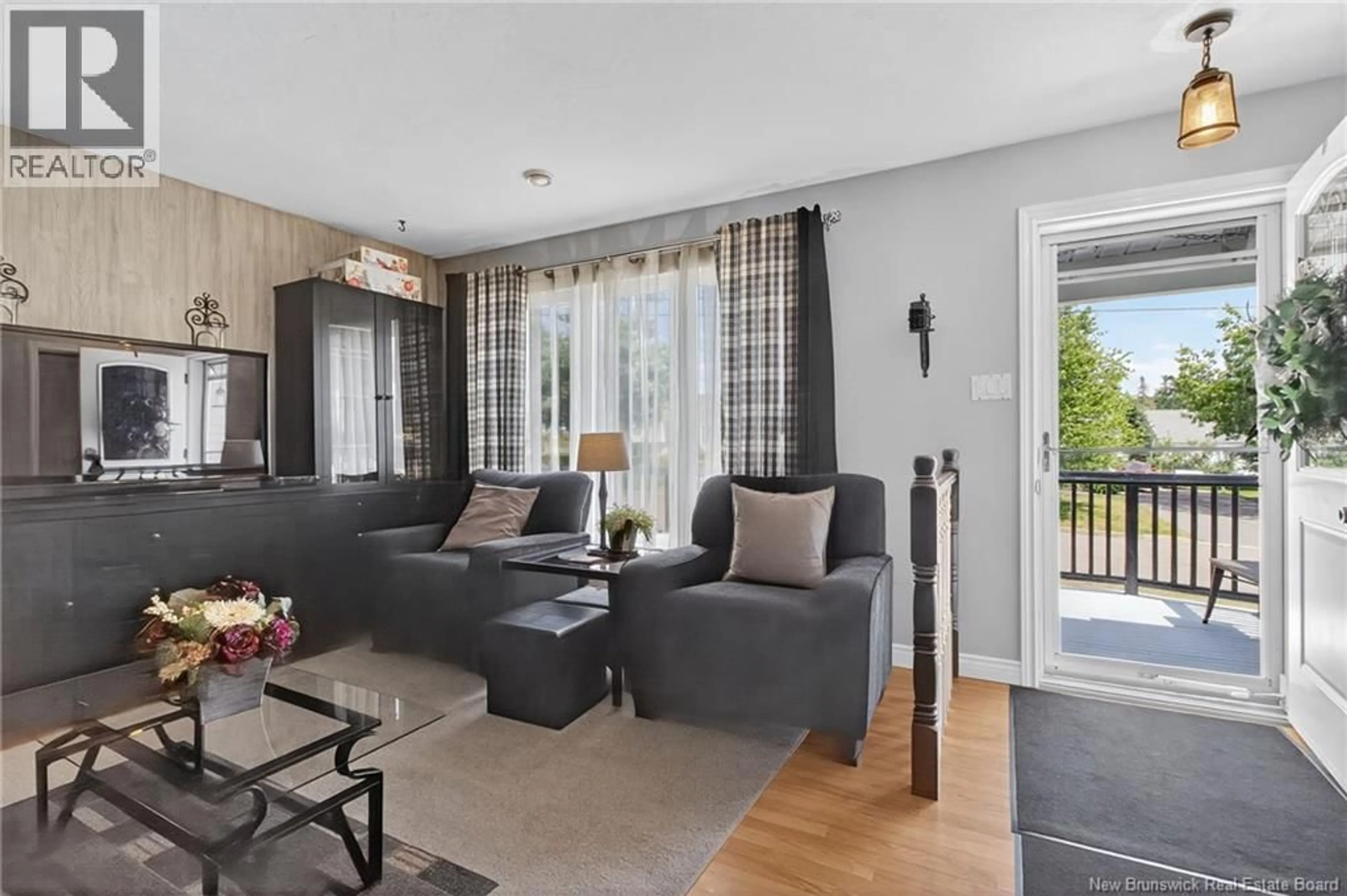 Living room with furniture, wood/laminate floor for 709 BOUDREAU STREET, Dieppe New Brunswick E1A6X5