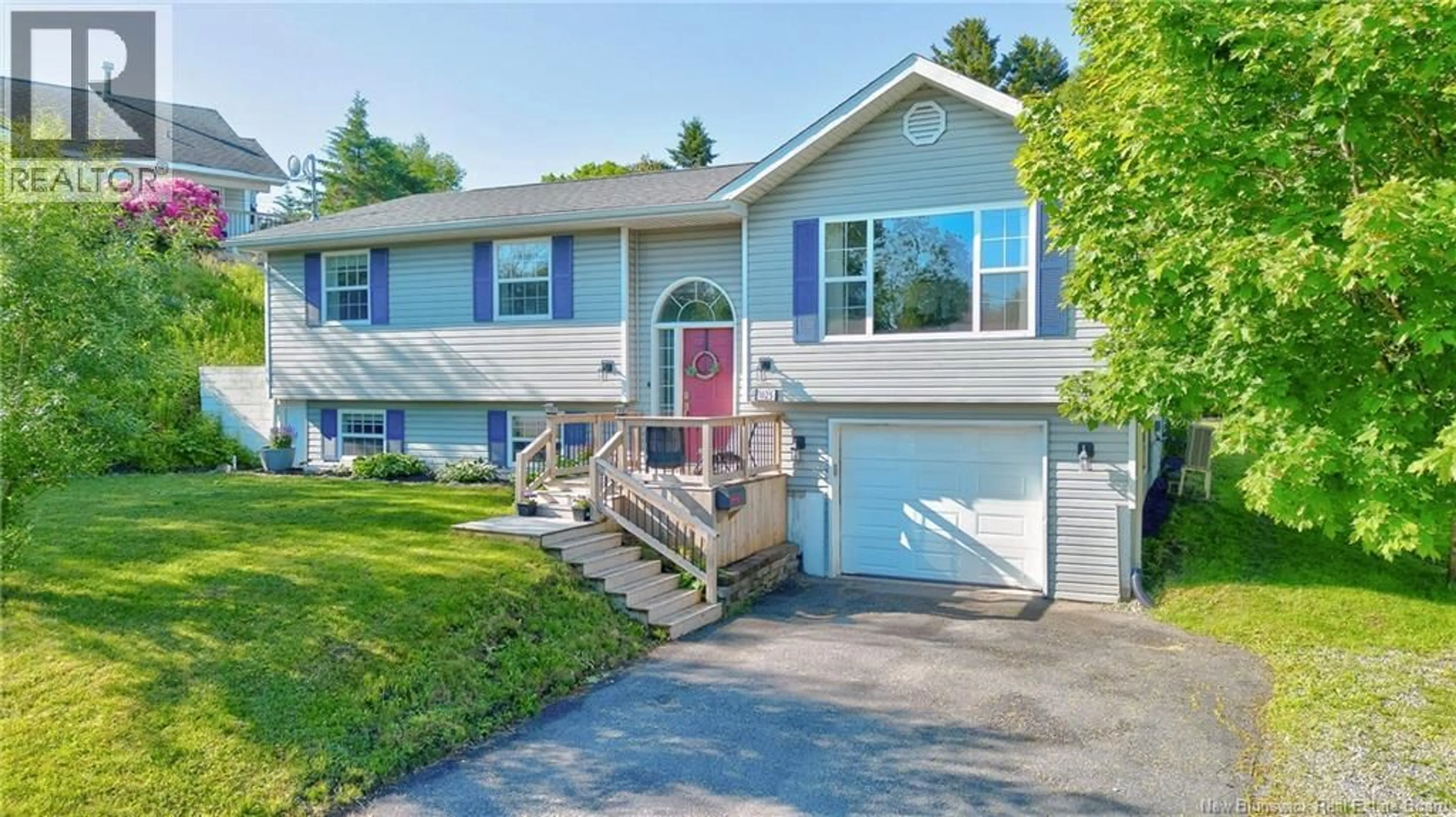 Home with vinyl exterior material, street for 1025 SAND COVE ROAD, Saint John New Brunswick E2M4X6