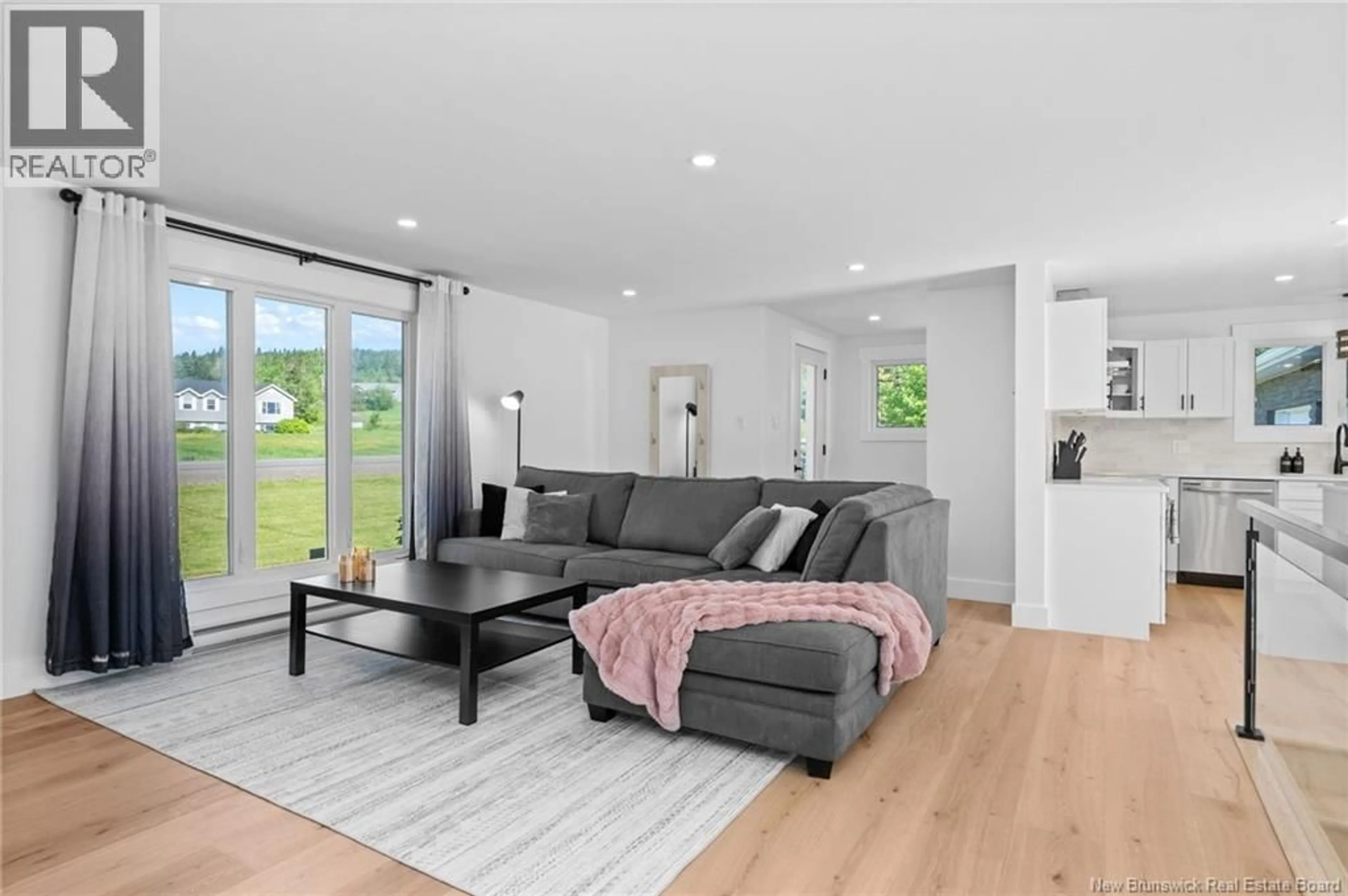 Living room with furniture, wood/laminate floor for 2287 ROUTE 490, Ammon New Brunswick E1G3P3
