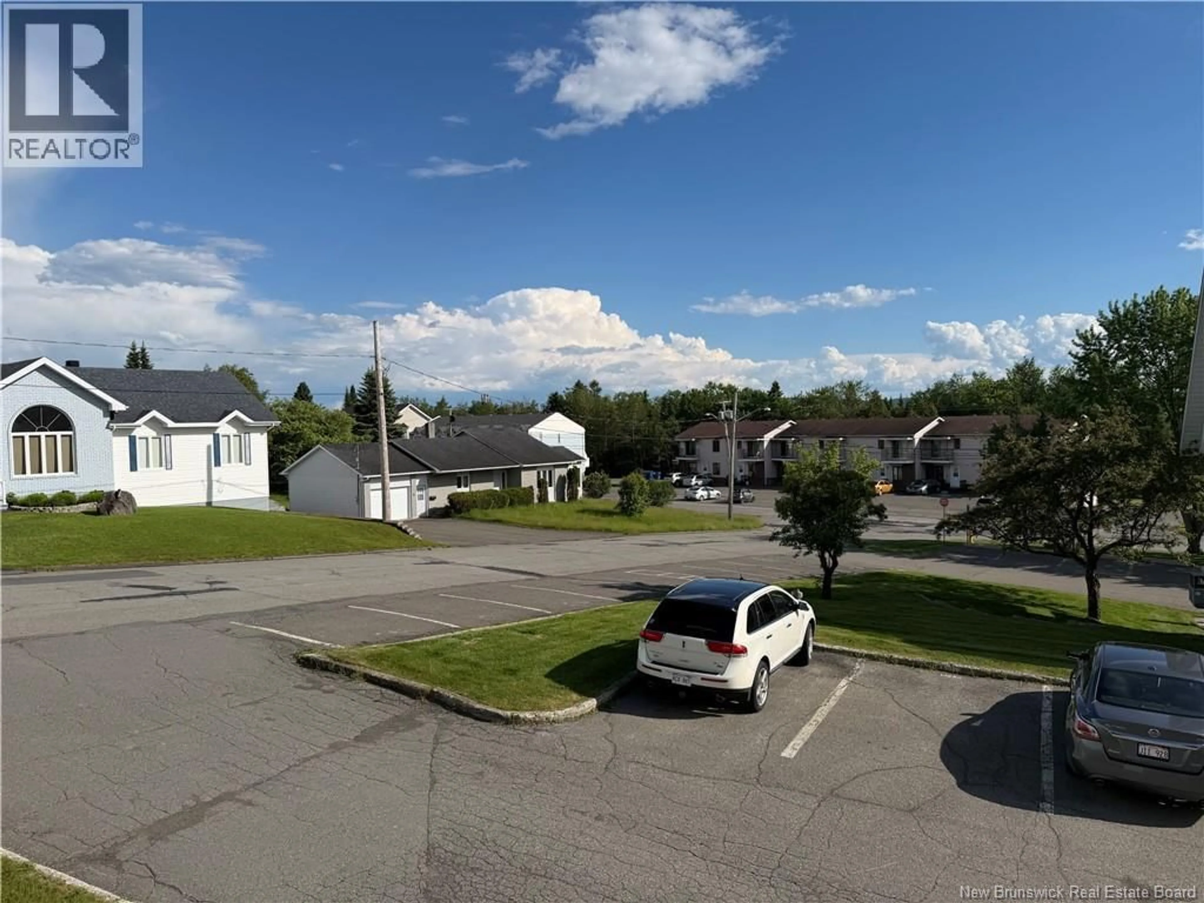 A pic from outside/outdoor area/front of a property/back of a property/a pic from drone, street for 20 DU BOURG AVENUE, Edmundston New Brunswick E3V4C5