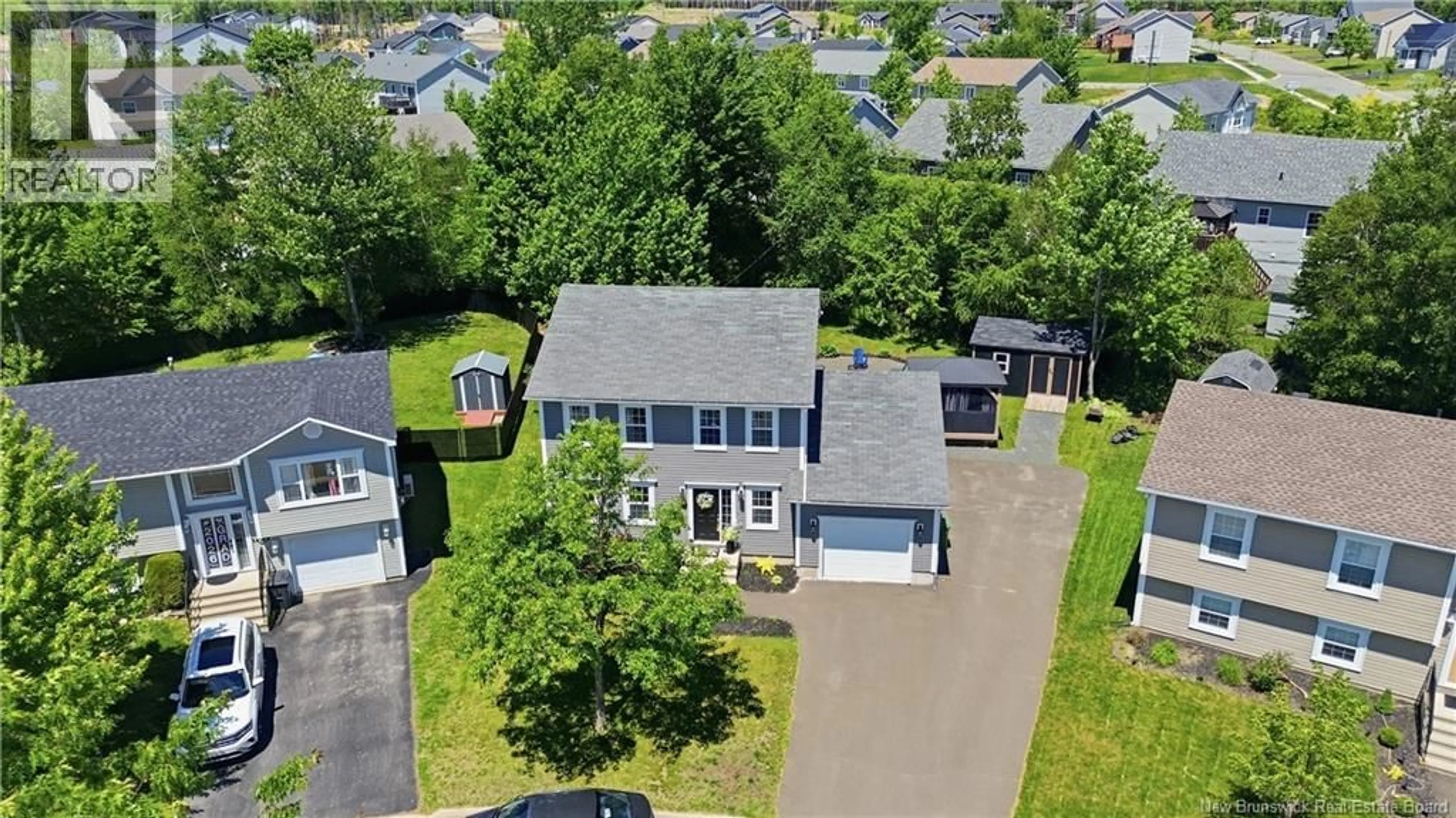 A pic from outside/outdoor area/front of a property/back of a property/a pic from drone, street for 92 BLANCHARD COURT, Fredericton New Brunswick E3G3X2