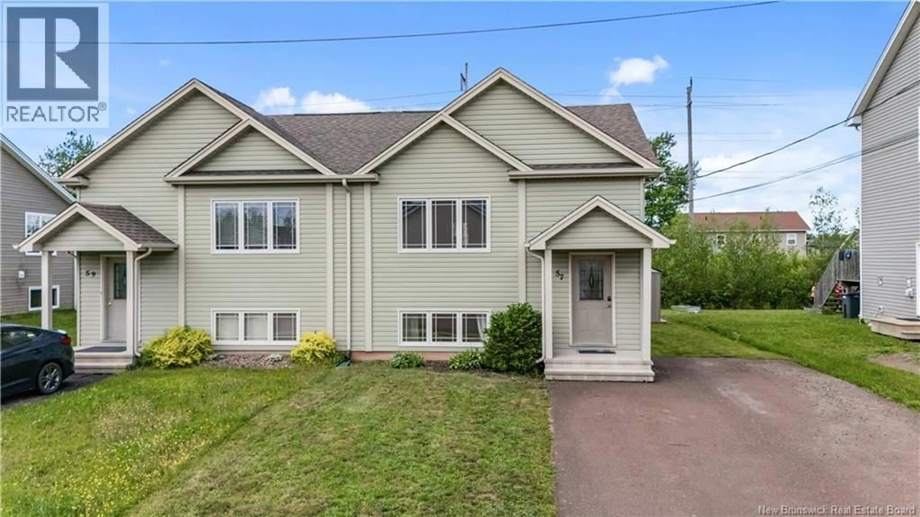 Home with vinyl exterior material, street for 57 CLARENDON DRIVE, Moncton New Brunswick E1G0X1