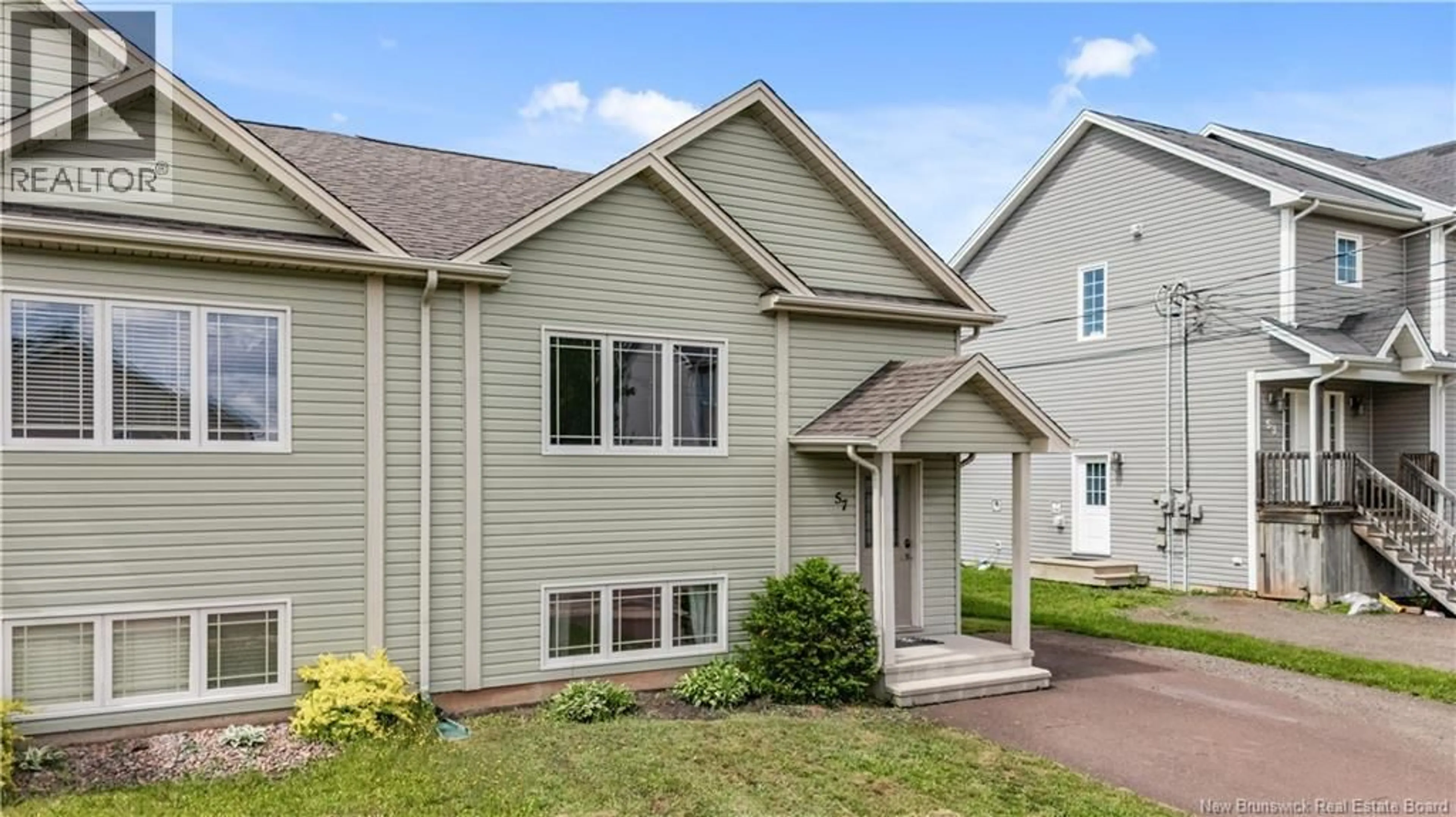 Home with vinyl exterior material, street for 57 CLARENDON DRIVE, Moncton New Brunswick E1G0X1